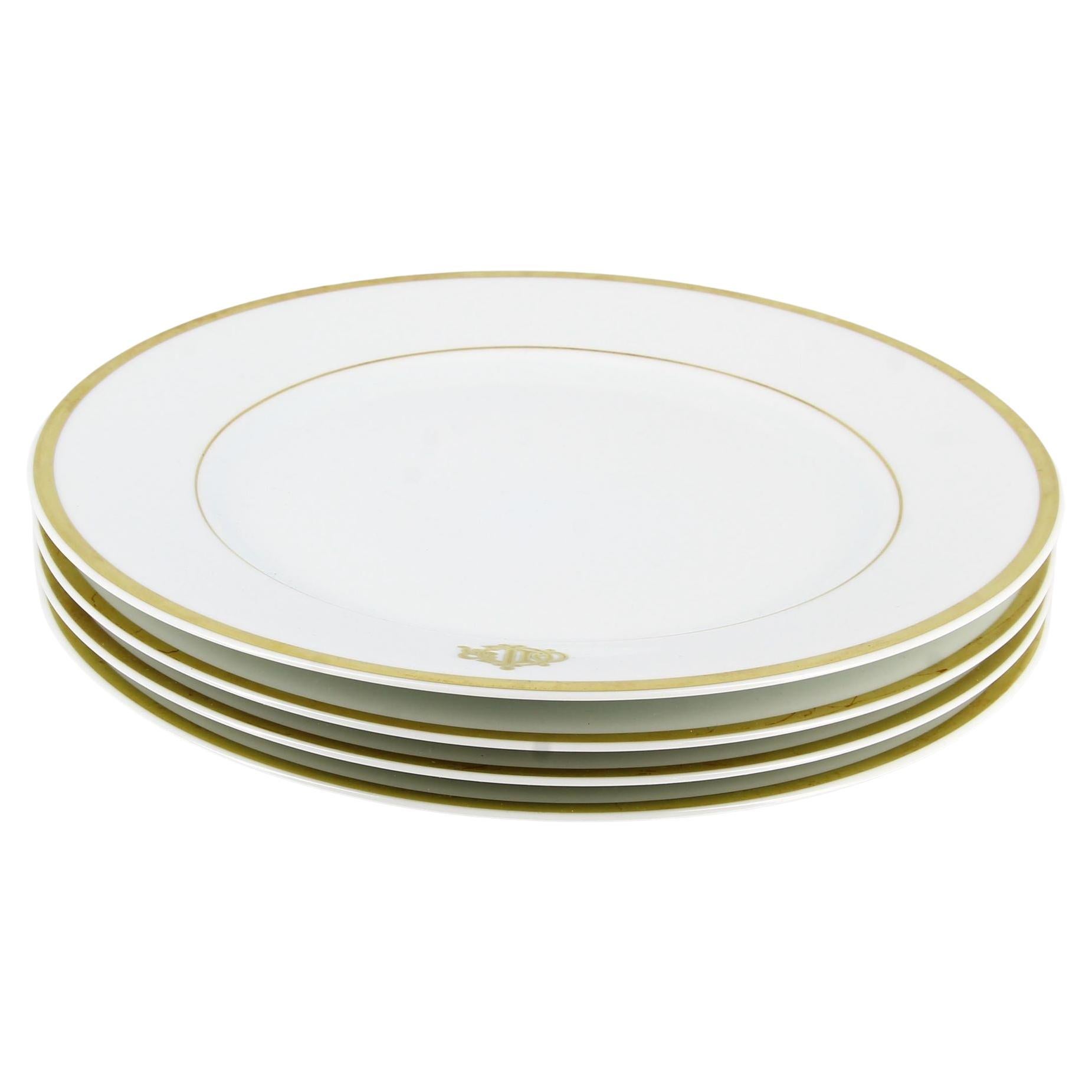4 assiettes en porcelaine de Limoges de Christian Dior 