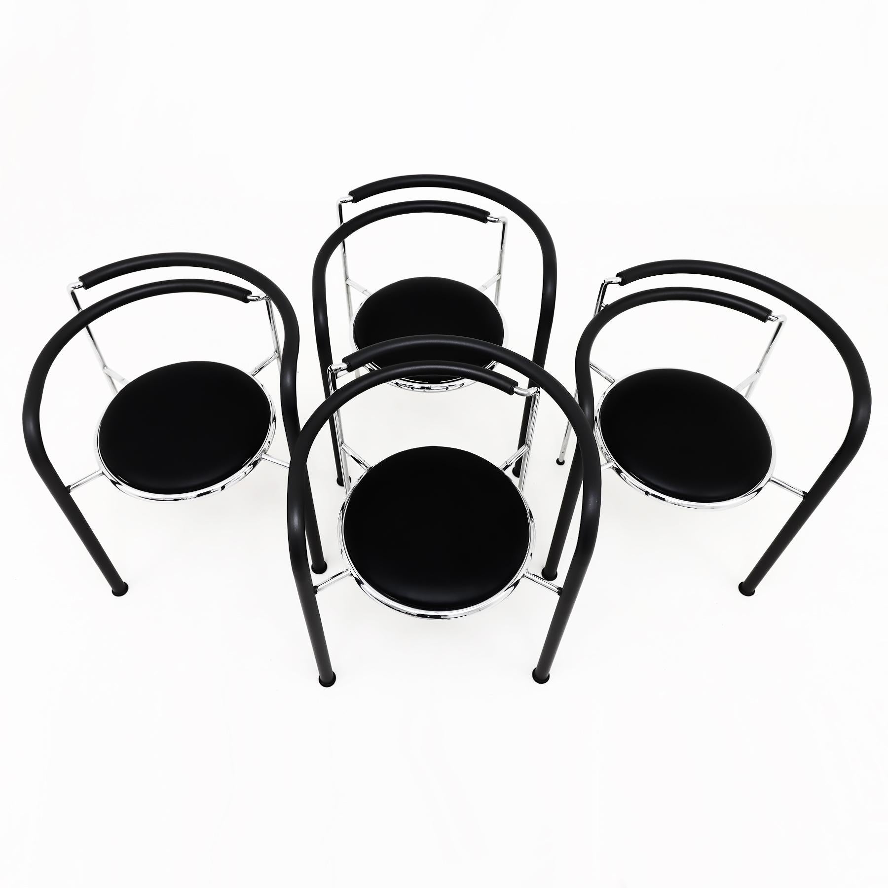 A set of 4 rare and beautiful Rud Thygesen and Johnny Sorensen Dark Horse chairs in chrome and black leather for Botium, 1980s.

The playful design elements of this postmodern seating group combine to make it the perfect centrepiece for any
