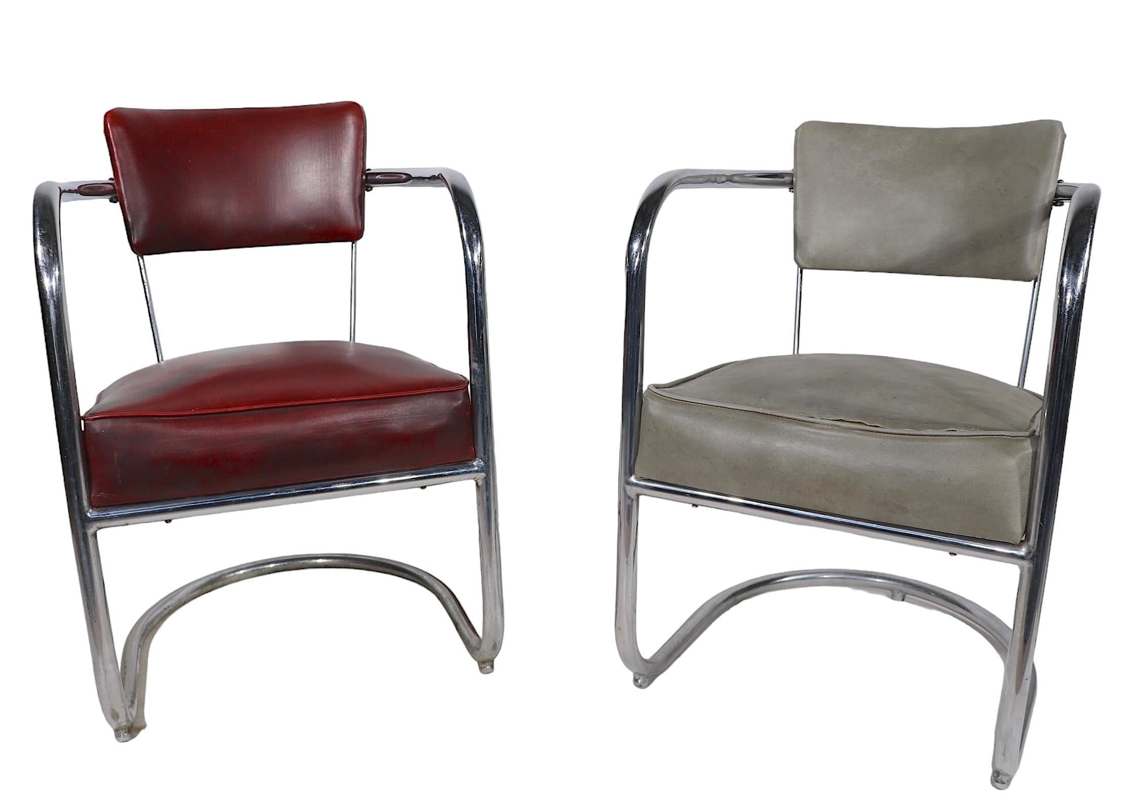 Tubular chrome barrel chairs, made by Lloyd furniture, design attributed to Kim Weber, circa 1930's. The chairs exhibit classic early Industrial, Machine Age, Art Deco style, having a continuous cantilevered  tubular frame,  with vinyl seats and