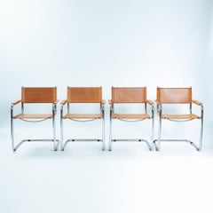 4 cognacfarbene Sattelleder-Freischwinger Bauhaus s 34 b 34 Stühle, 1970er Jahre
