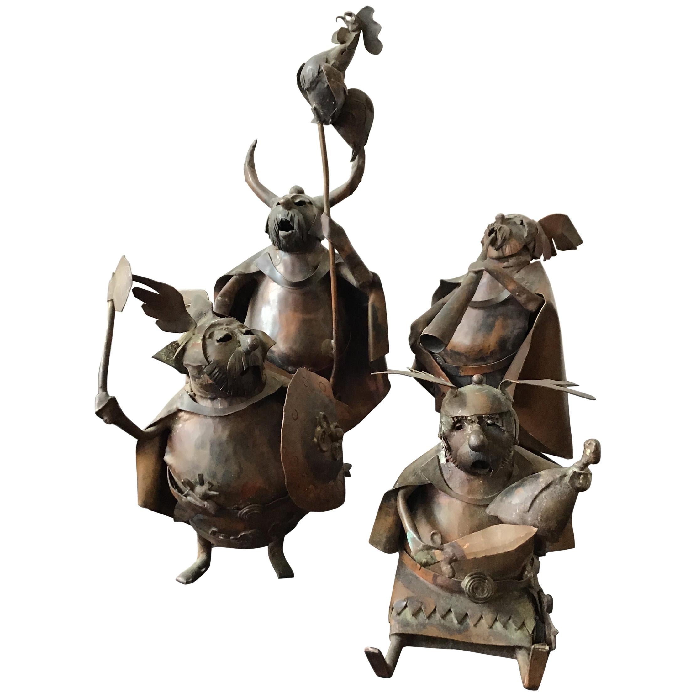 4 statues de Vikings cuivre