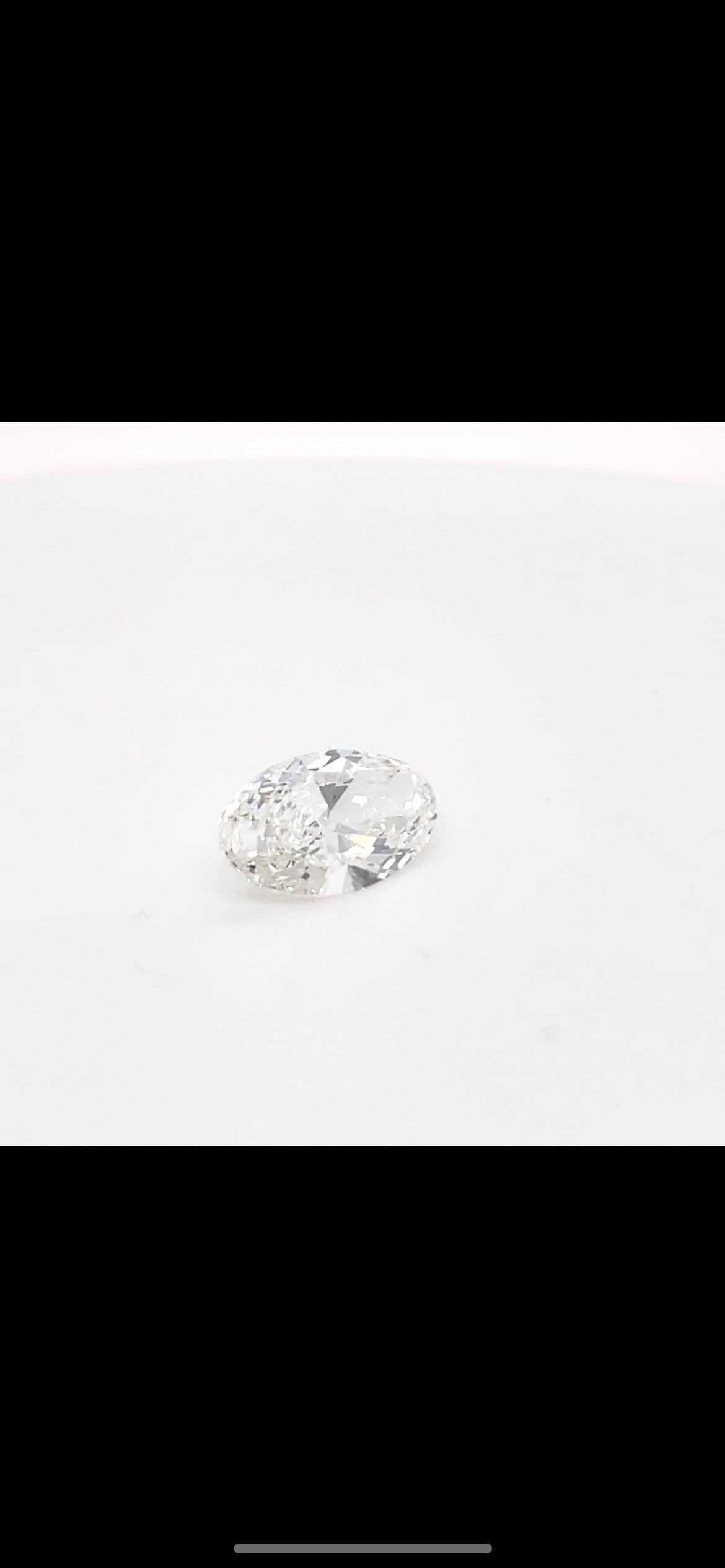 spread diamond engagement ring