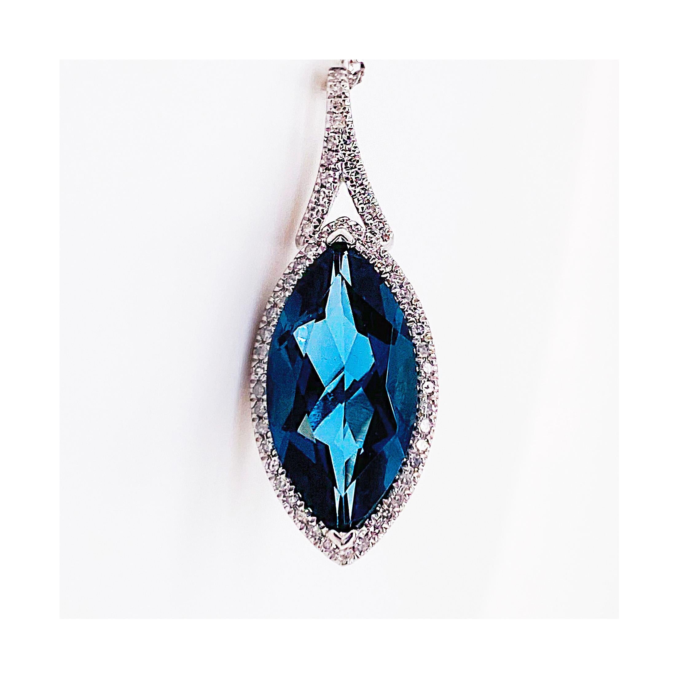 The 4.19 carat Royal London Blue Topaz is in 14K White Gold is magnificent! It has a string of diamonds going all the way around it and diamonds on the bail!  The pendant matches really well with a pair of dangle earrings in our shop