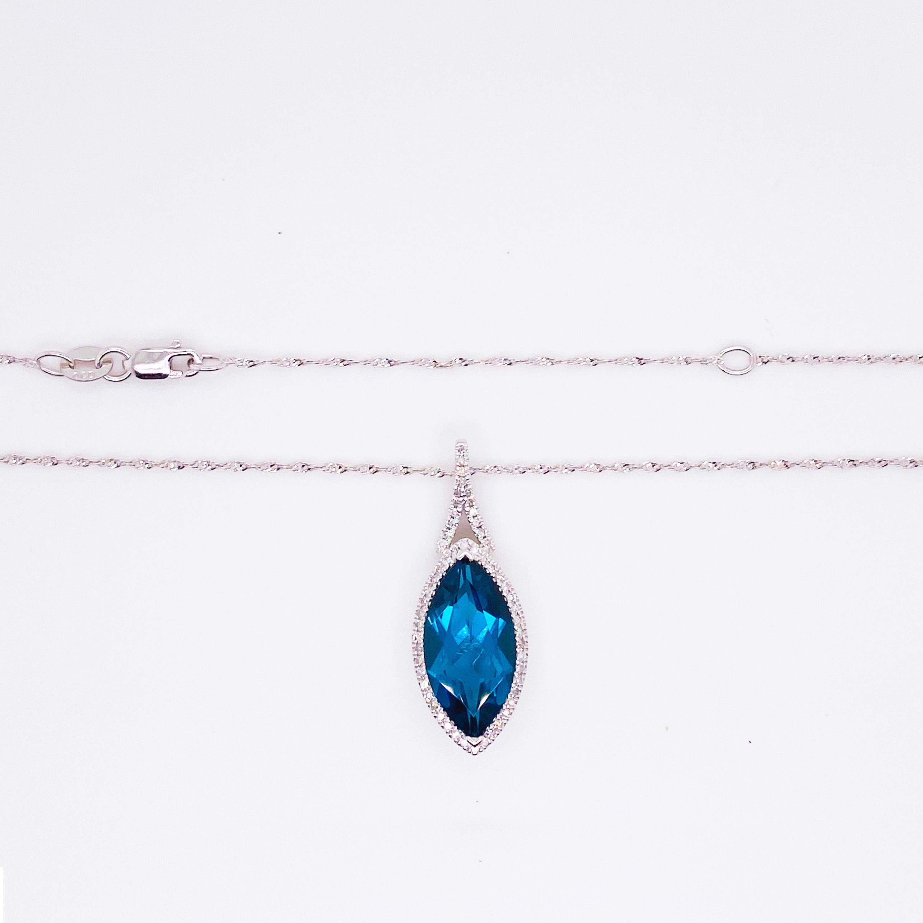 blue topaz and diamond halo pendant