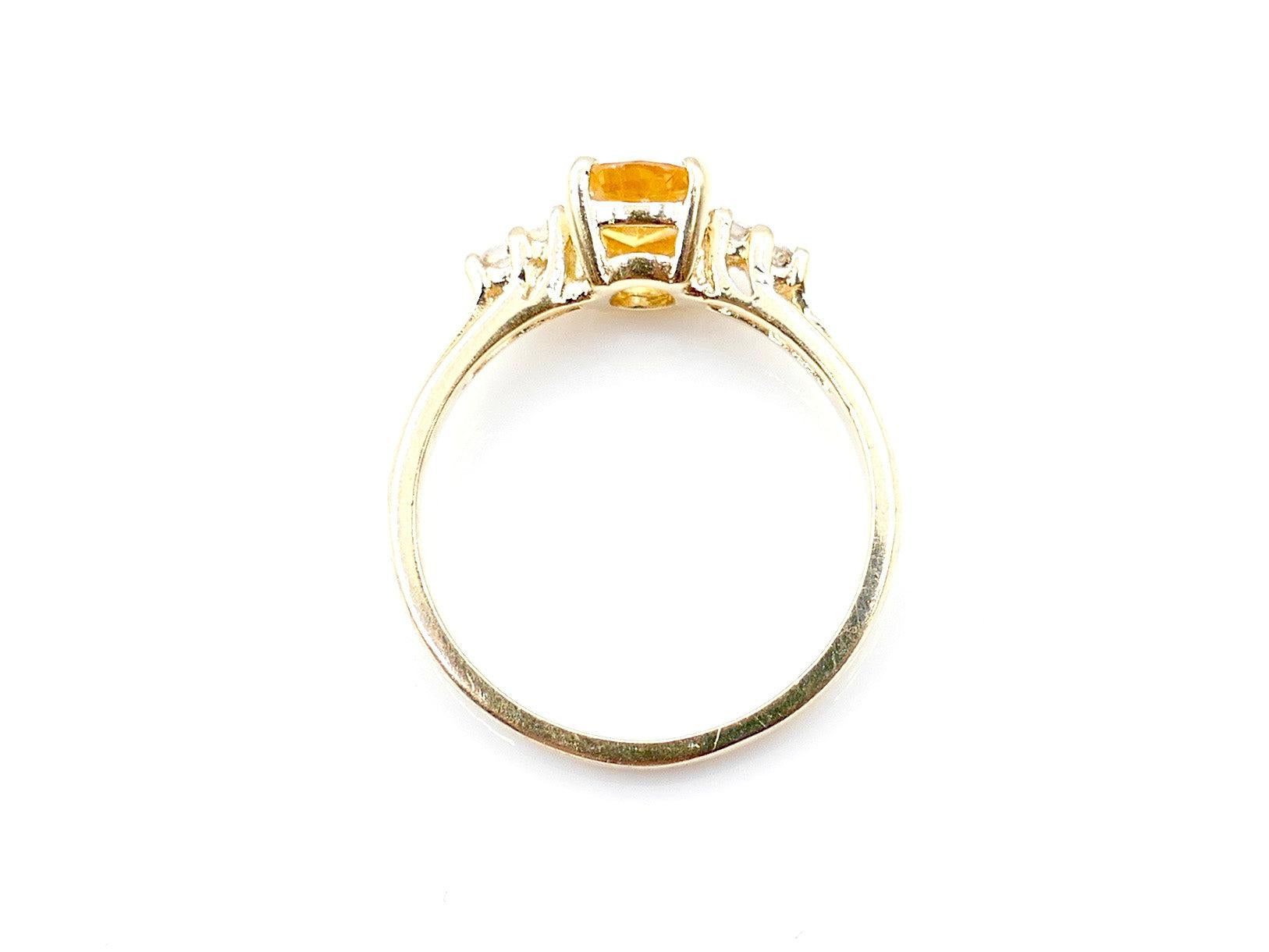 Contemporary 1 Ct Yellow Sapphire and Yellow Gold Ring For Sale