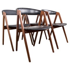 4 Danish chairs in Afrormosia and skai model 205 by Thomas Harlev 1960.