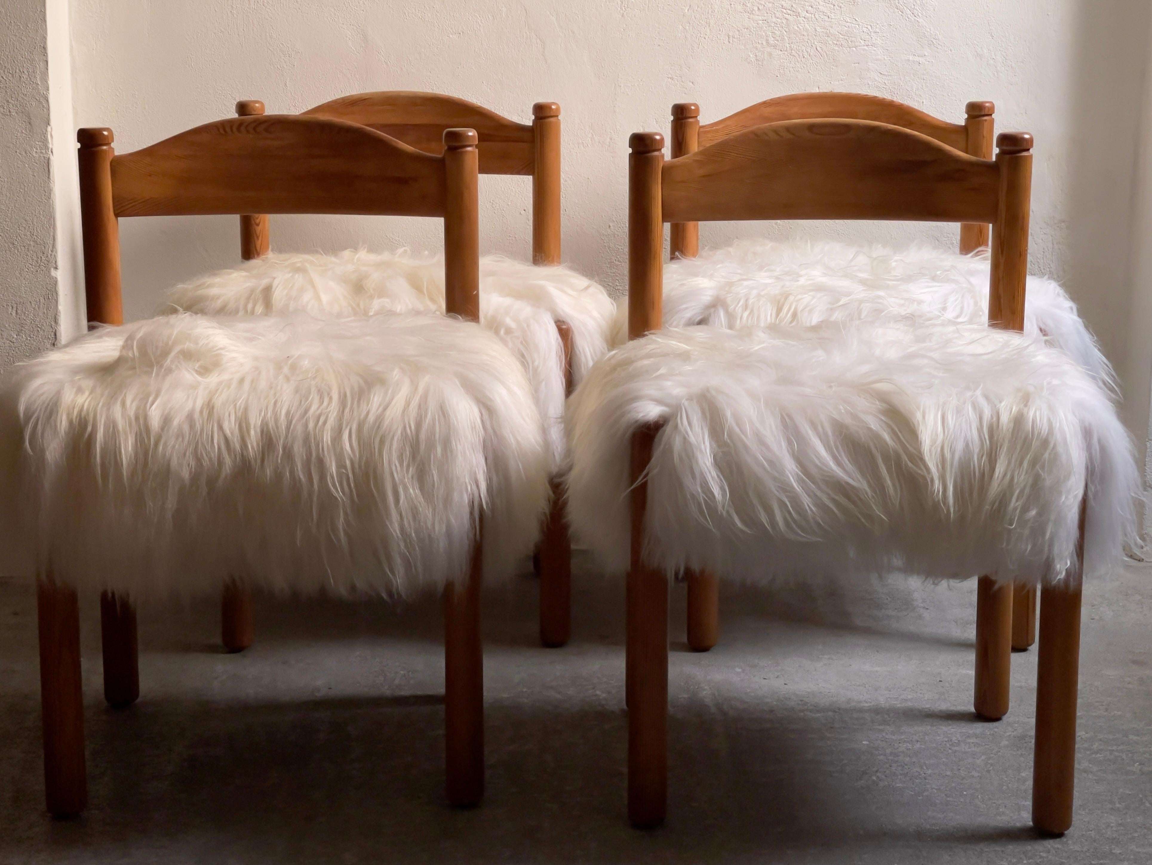 Four dining chairs in pine reupholstered in long haired sheepskin. Denmark 1970s For Sale 3