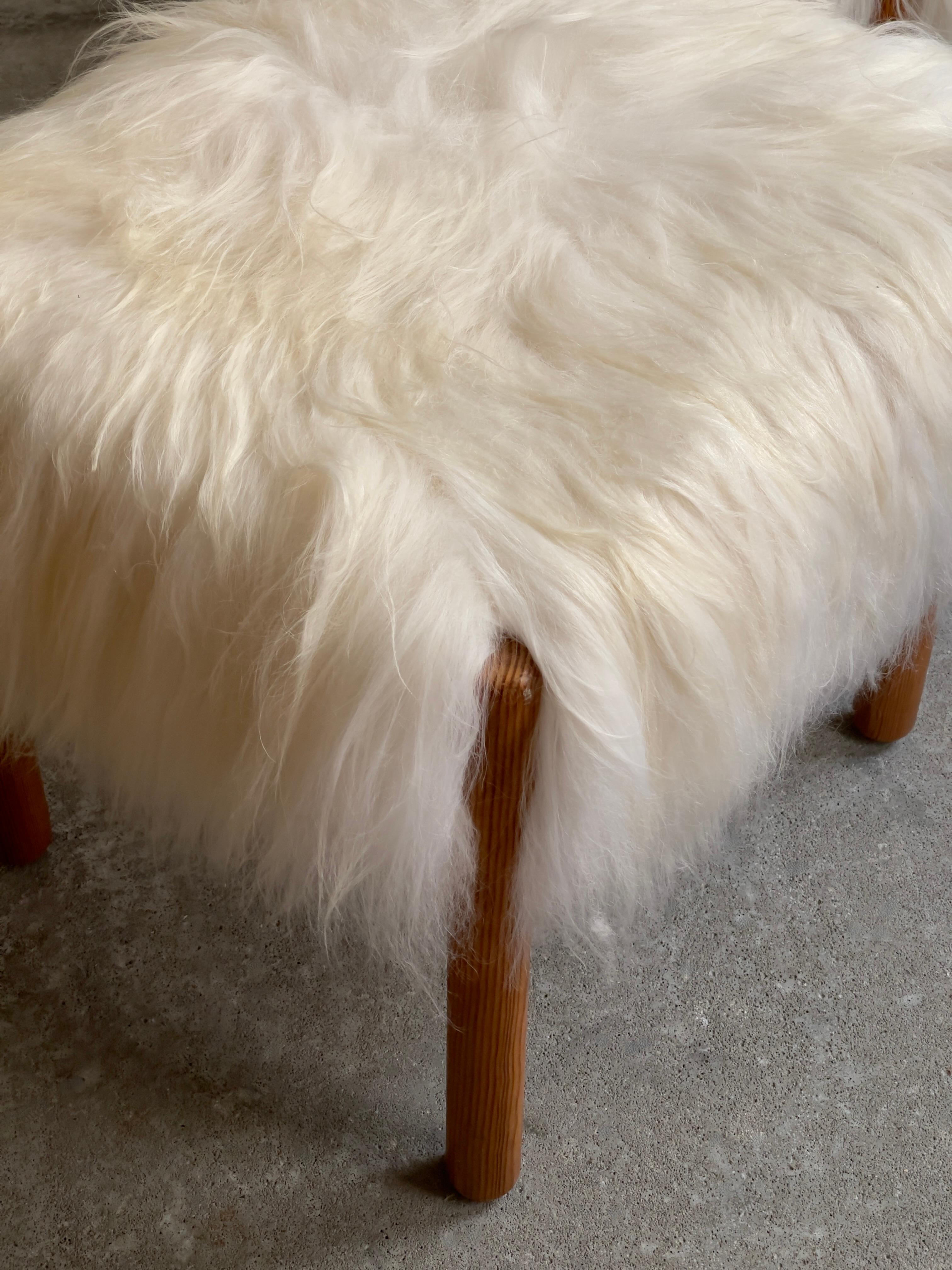 Late 20th Century Four dining chairs in pine reupholstered in long haired sheepskin. Denmark 1970s For Sale