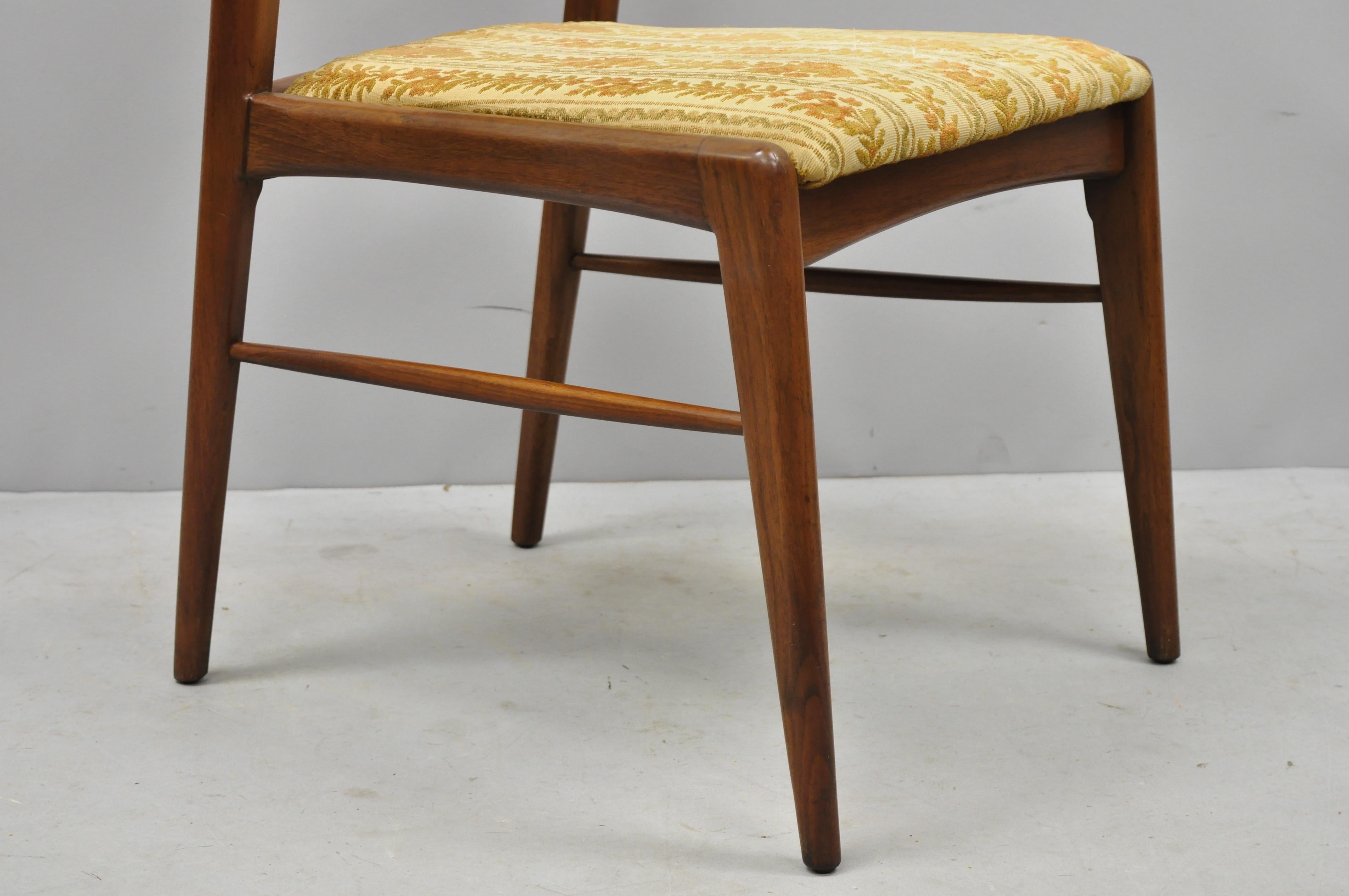 4 Danish MCM Walnut Cane Back Dining Chairs after TH Robsjohn Gibbings In Good Condition For Sale In Philadelphia, PA