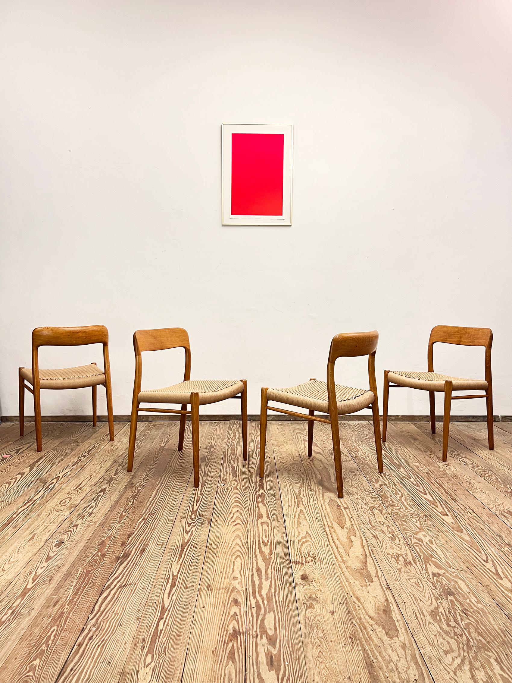 Dimensions: 50x47x75x44cm (Width x Depth x Height x Seat Height)

Danish Design by Niels O. Møller manufacured by J.L. Møllers in Denmark in the 1950s. The set features 4 oak wood chairs of Niels O. Møllers famous model 75, a Scandinavian design