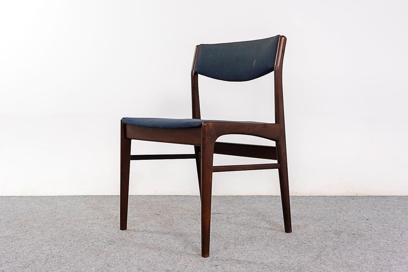 Rosewood mid-century dining chairs, circa 1960's. Curved backrests and generous seat. Solid frame with cross braces for added stability and support. Original upholstery with wear.

Unrestored item with option to purchase in restored condition for