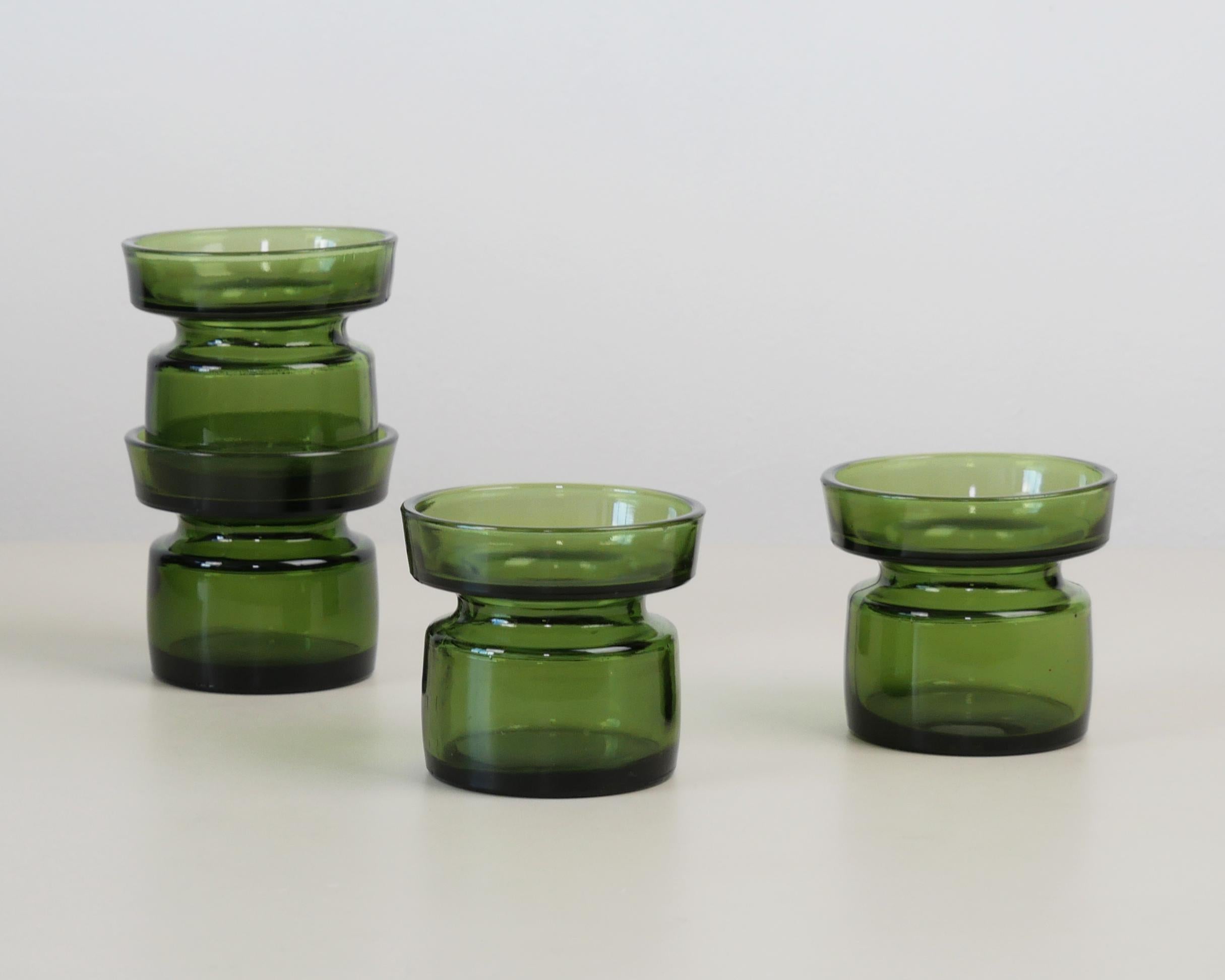 Jens Quistgaard for Dansk Designs, c. 1960
Set of 4 tealight / candle holders
Green tinted glass
All in excellent condition
Dimensions each approx.: diameter 7.5cm; height 6.5cm; weight: 155g