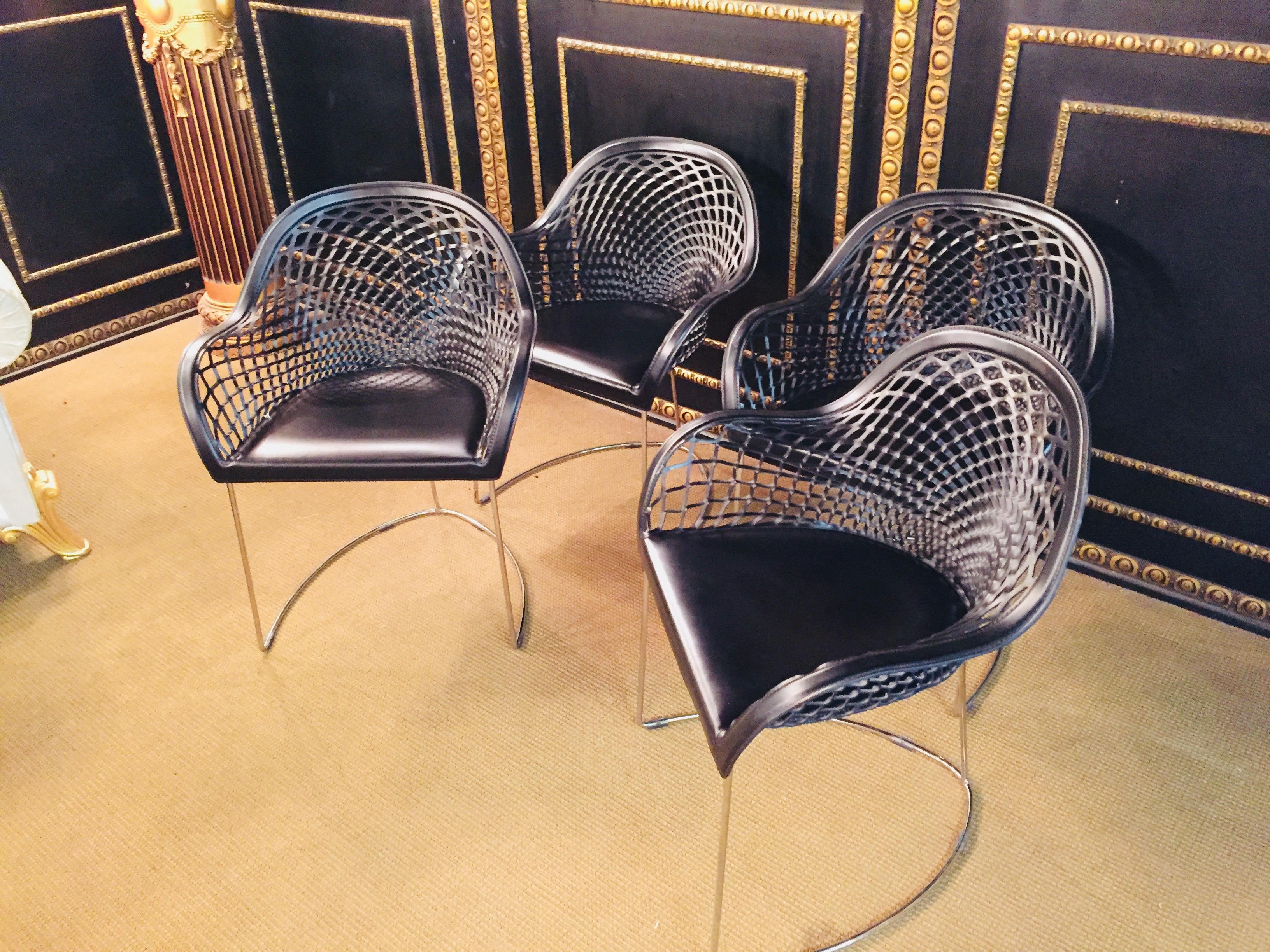 4 very beautiful and modern leather chairs of the brand Midj.
beautiful braided leather
Frame chrome.
 