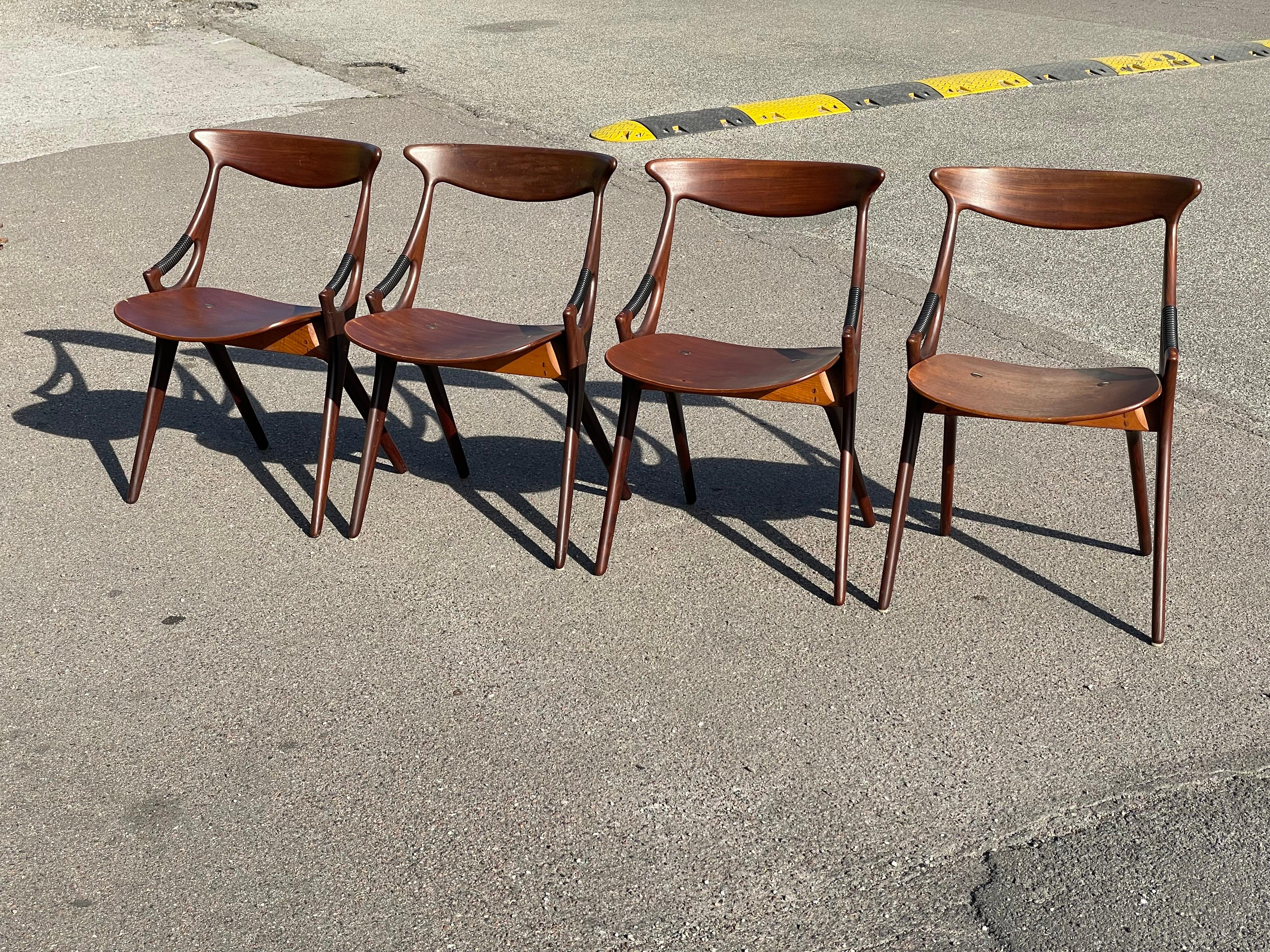 Sculptural Mid-Century Modern dining chairs designed by Arne Hovmand-Olsen for Mogens Kold Møbelfabrik.