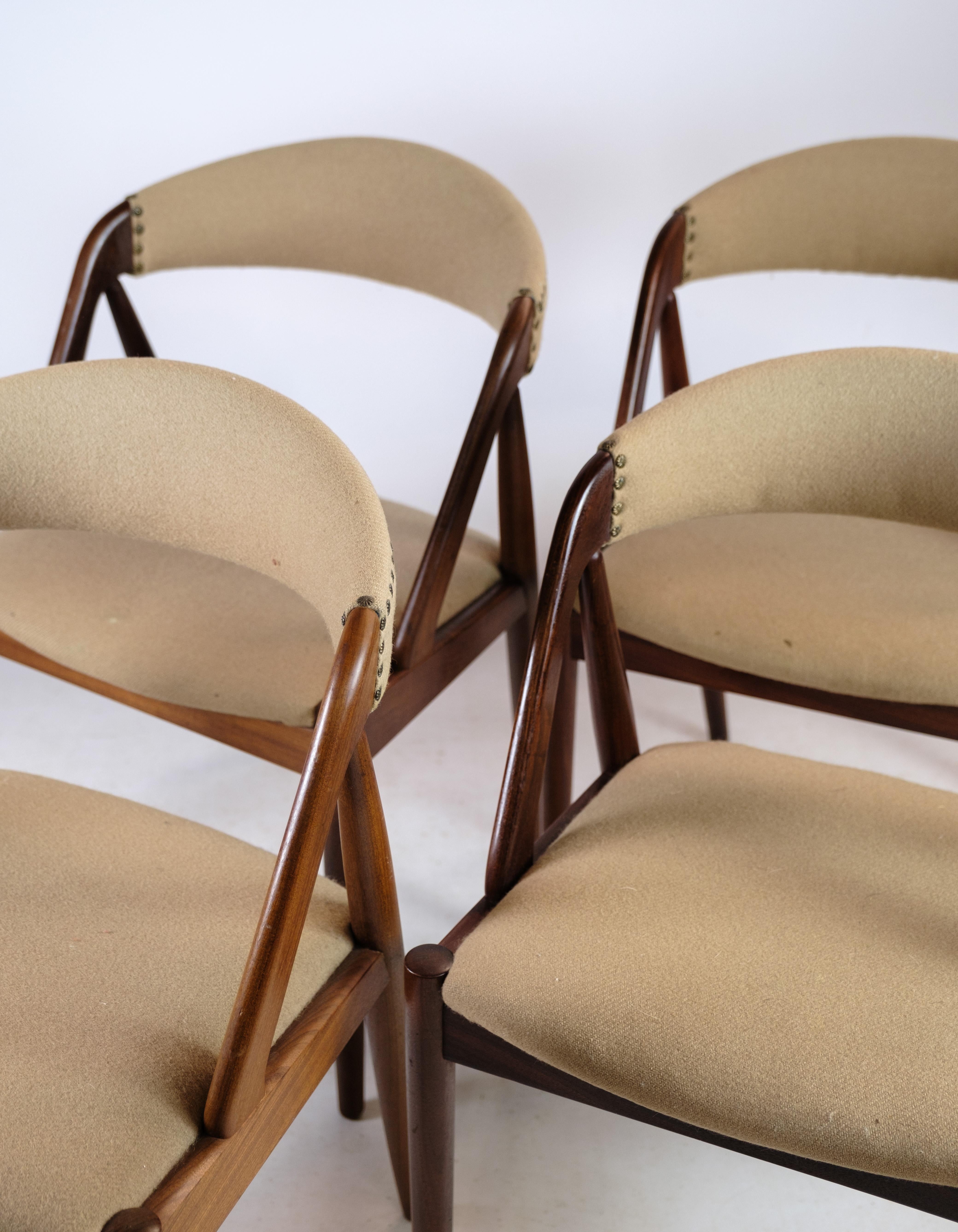 Milieu du XXe siècle 4 chaises de salle à manger modèle 31 en teck, conçues par Kai Kristiansen en vente