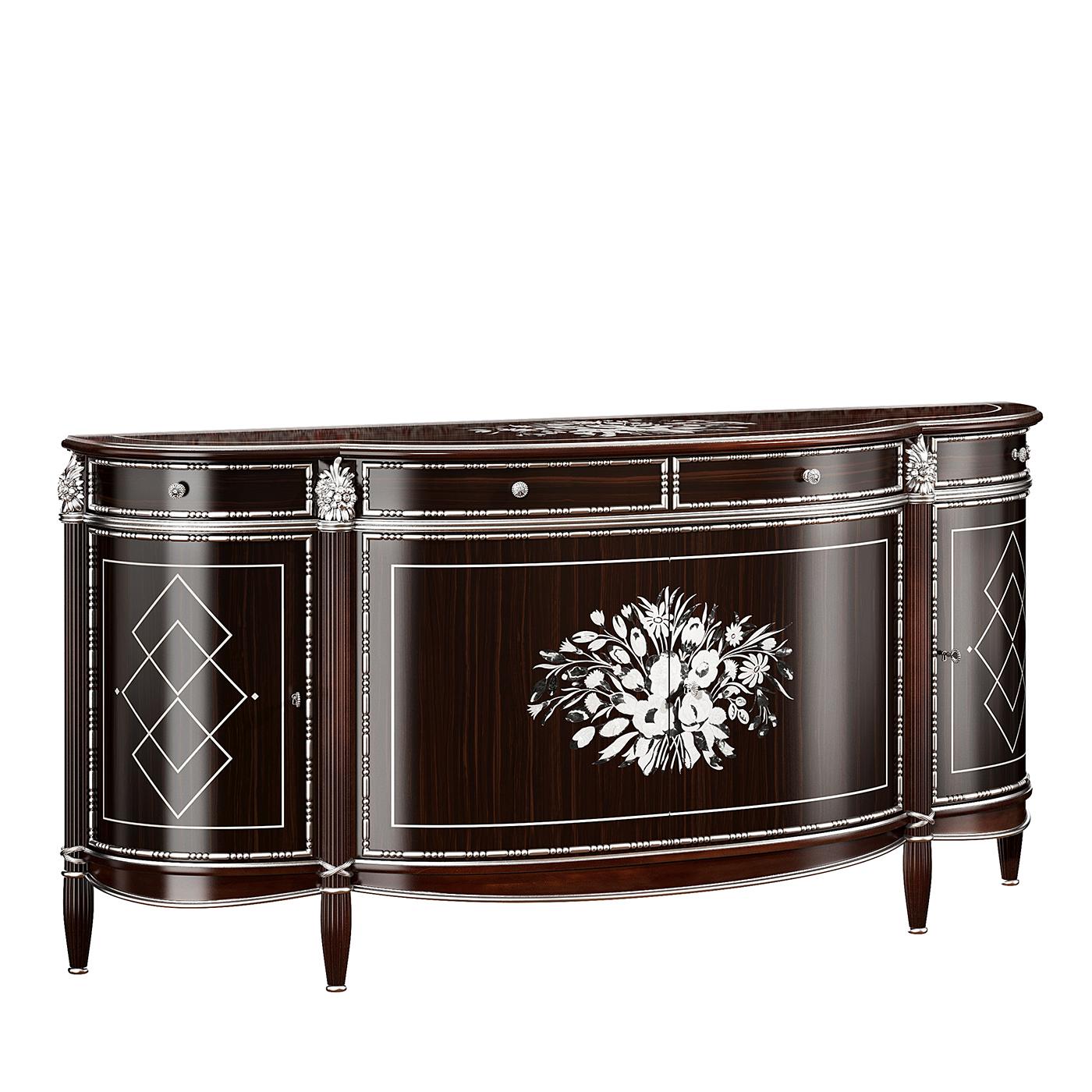 A testament of Art Deco design boasting a plush, sophisticated allure, this sideboard is made of Makassar ebony wood and is enriched with inlay works in white Australia and black Tahiti mother-of-pearl, and silver leaf carvings. The piece features