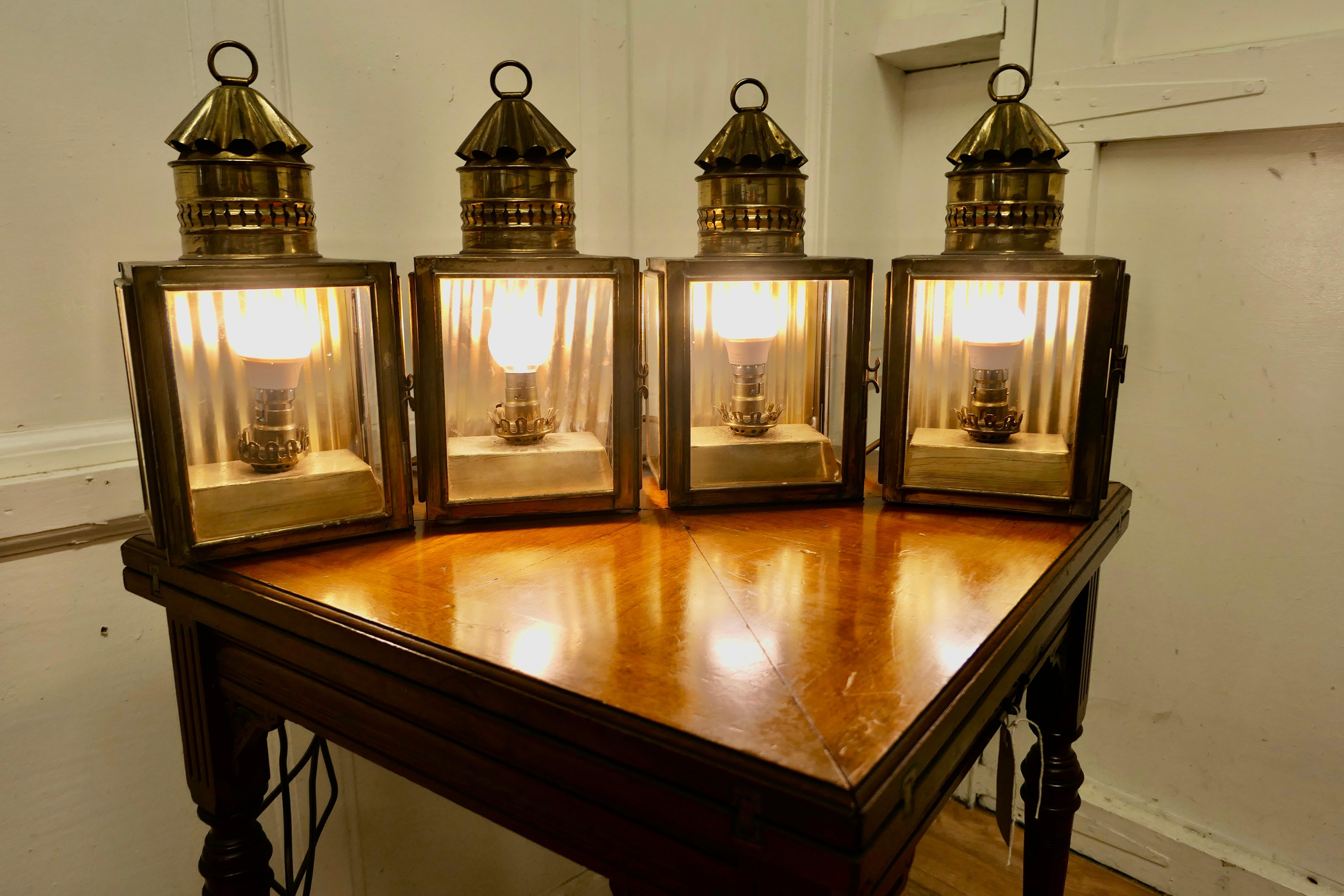 4 Electrified brass carriage lights, oil lamps.

4 Lovely pieces, dating back to the 19th century. 
Wonderfull authentic pieces, they are made in brass. 
These lights would have been used inside a carriage, originally they would have been oil