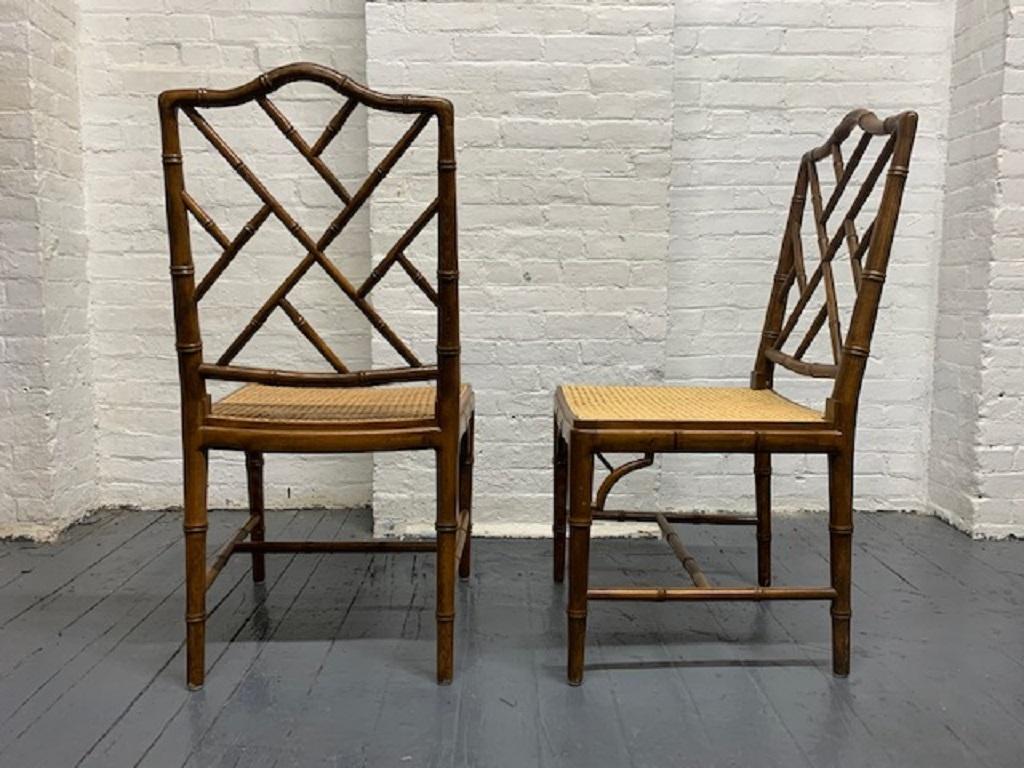 Four faux bamboo Chinese Chippendale style chairs with cane seats.