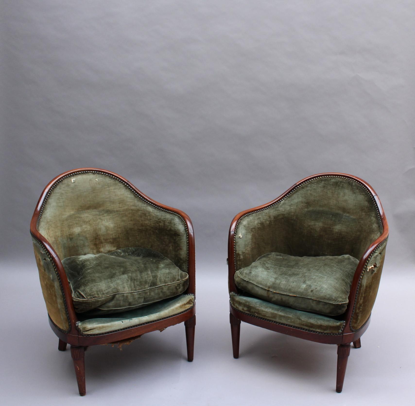 Two fine French Art Deco mahogany gondola armchairs.
The first picture show 4 armchairs but 2 of them have been sold.