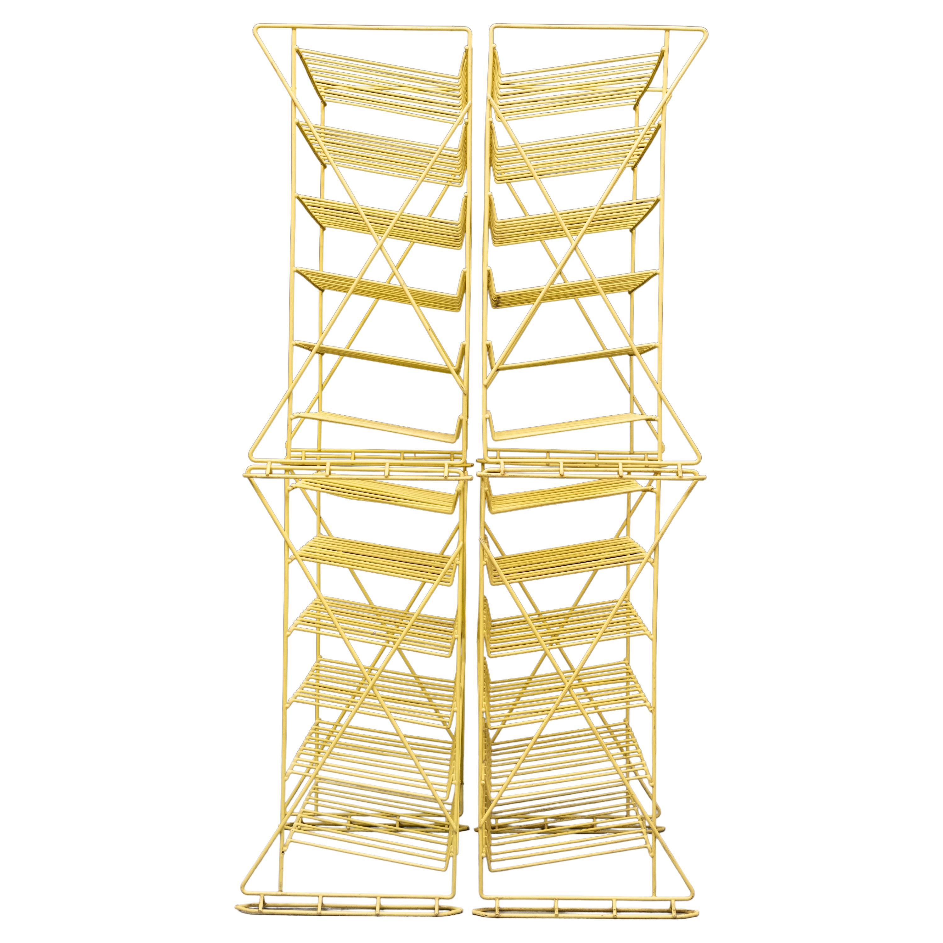 Ideal for your Wine storage . 4 free standing Wine racks . each 
can contain 30 bottles .  Stack able .They are made of Metal thread 
covert in Plastic . Yellow color .   1970s 

Please ask for cheaper  shipment solutions .