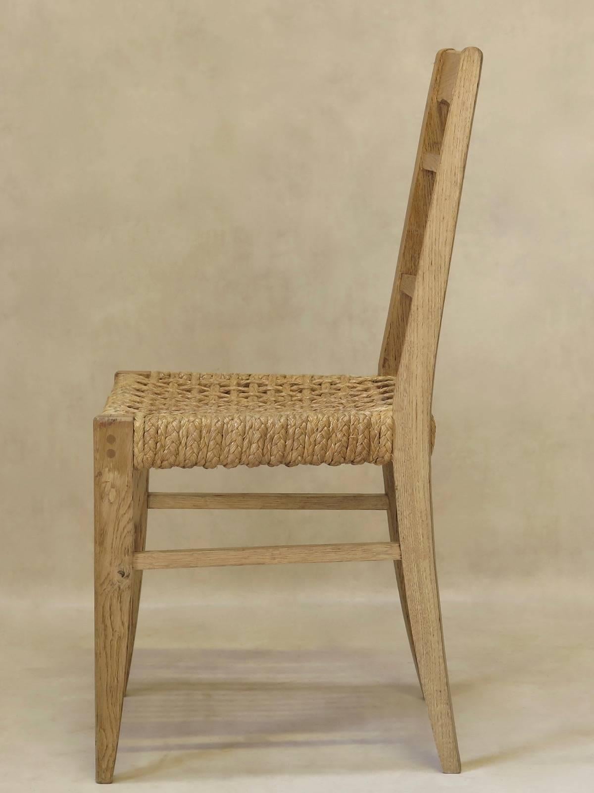 Français Quatre chaises françaises des années 1950 attribuées à Audoux-Minet en vente