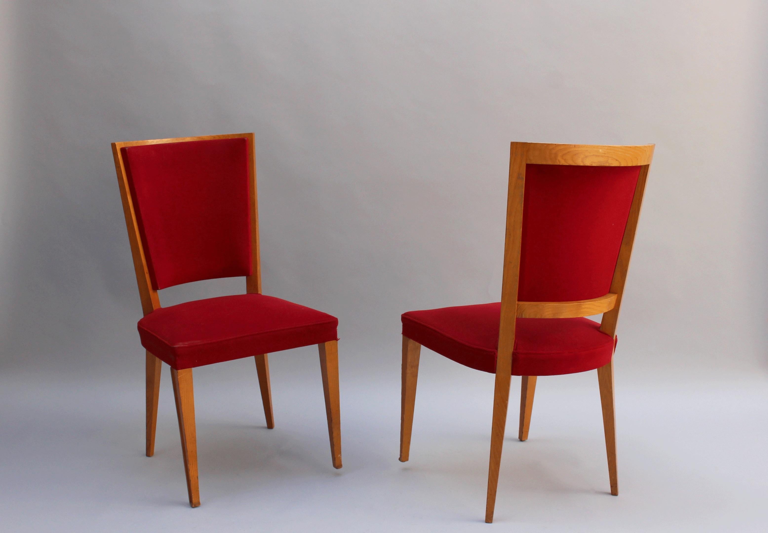 Four French 1940s solid oak dining chairs.
Price is per chair.