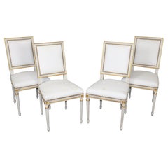 4 French Louis XVI Style Distressed Paint Decorated and Gilt Dining Chairs