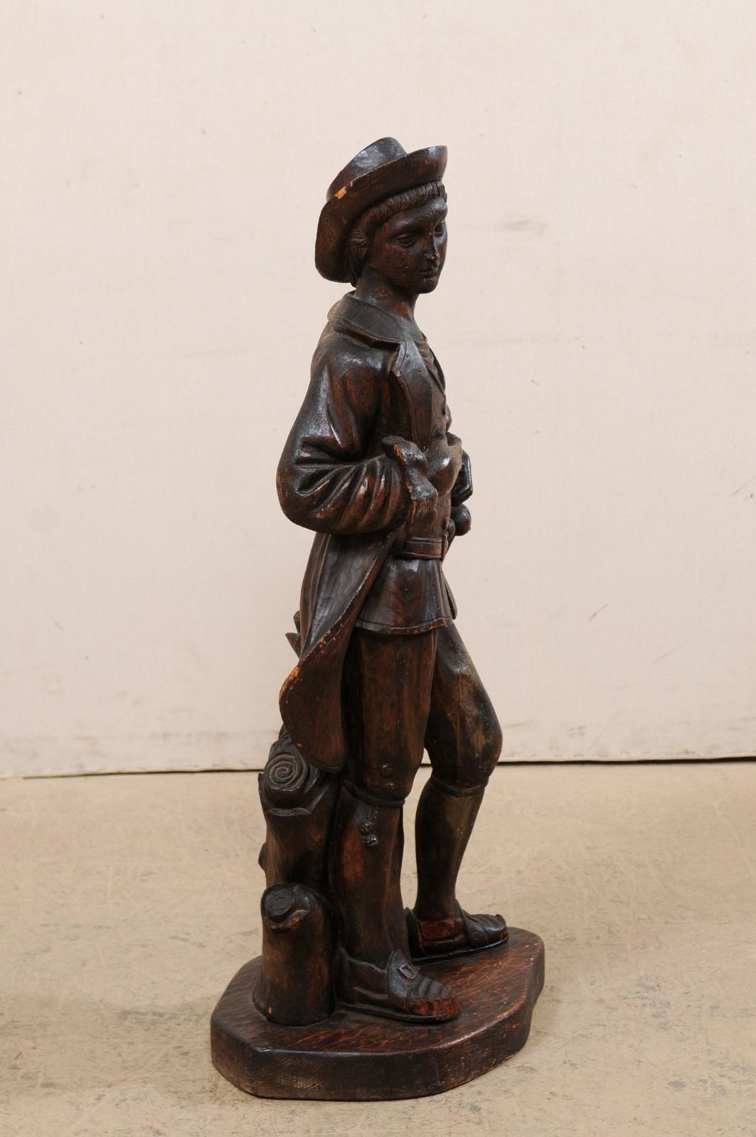 20th Century Italian Carved-Wood Statue of Male Figure holding a Basket, Mid 20th For Sale