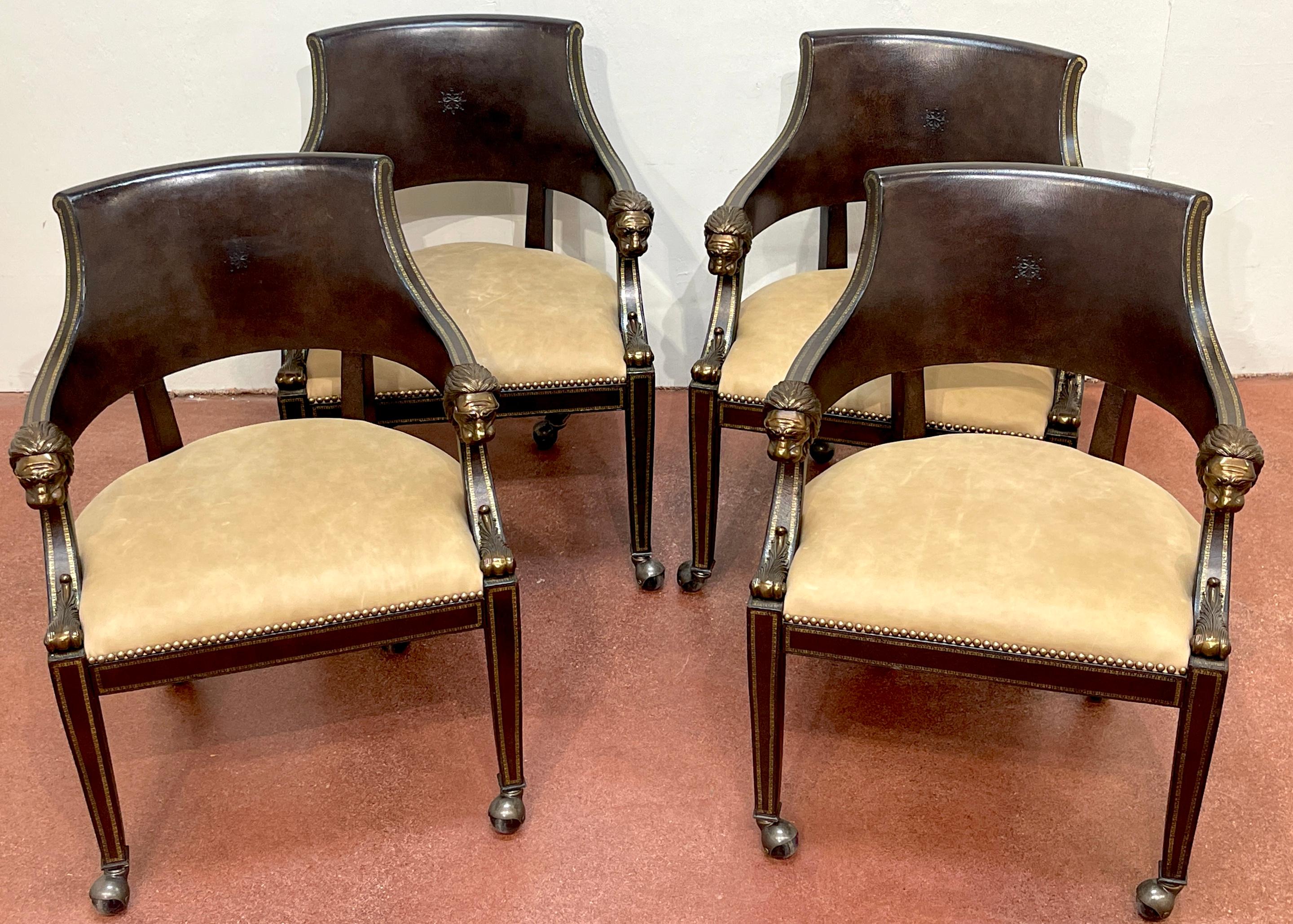 4 Gilt Leather Tooled Bronze Lion Head Armchairs on Castors, By Maitland-Smith

A set of four exquisite Regal Gilt Leather Tooled Bronze Lion Head Armchairs by Maitland-Smith. Standing at an impressive 33 inches high and 25 inches wide, these