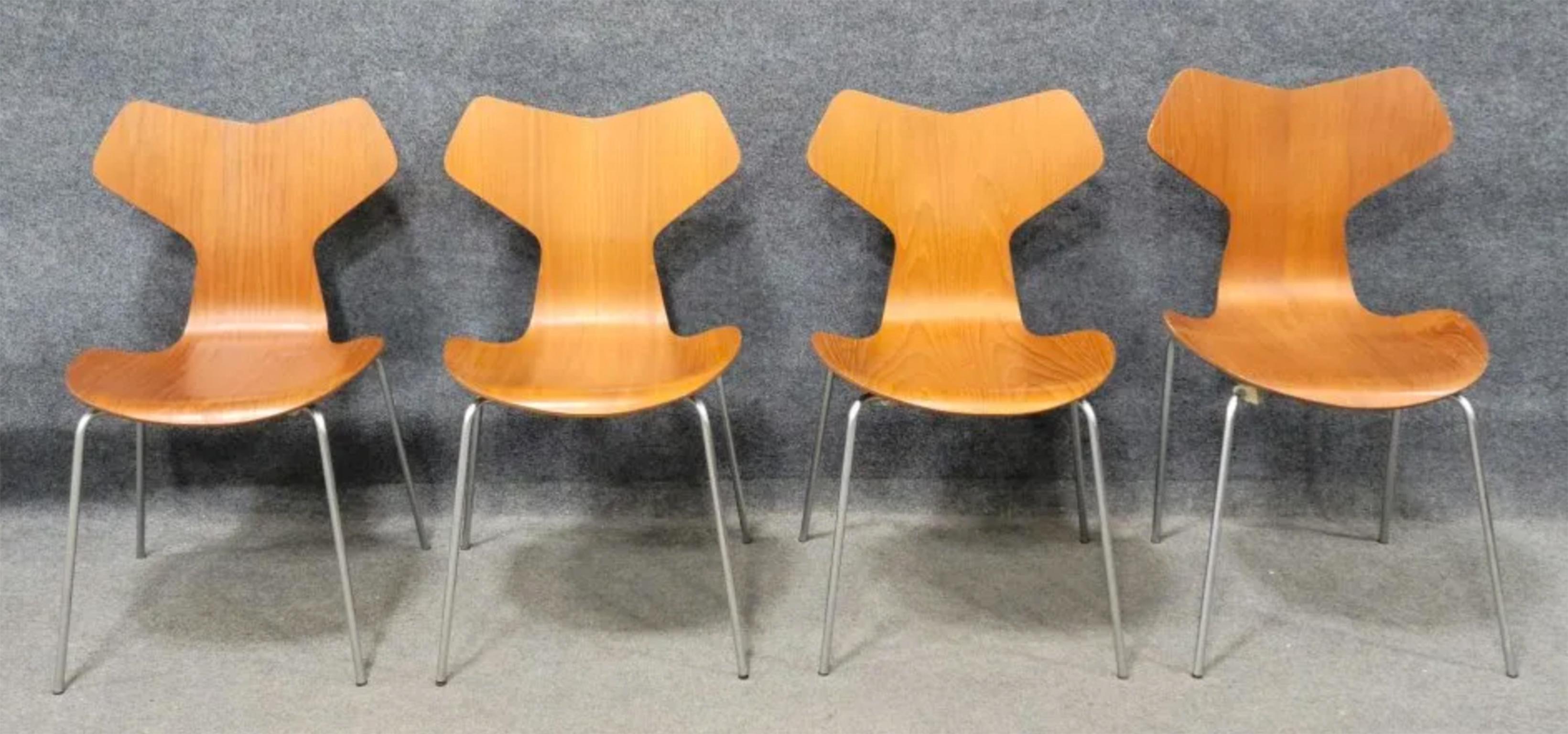 Set of 4 Danish Grand Prix 3130 Chair by Arne Jacobsen for Fritz Hansen in teak wood with chrome base. Labeled on bottom. Clean chairs. Located in Brooklyn NYC.