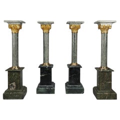 4 green marble columns with Corinthian ormolu capitals