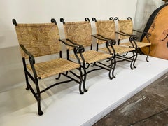 4 Heavy Hand Wrought Iron and Woven Raffia Armchairs