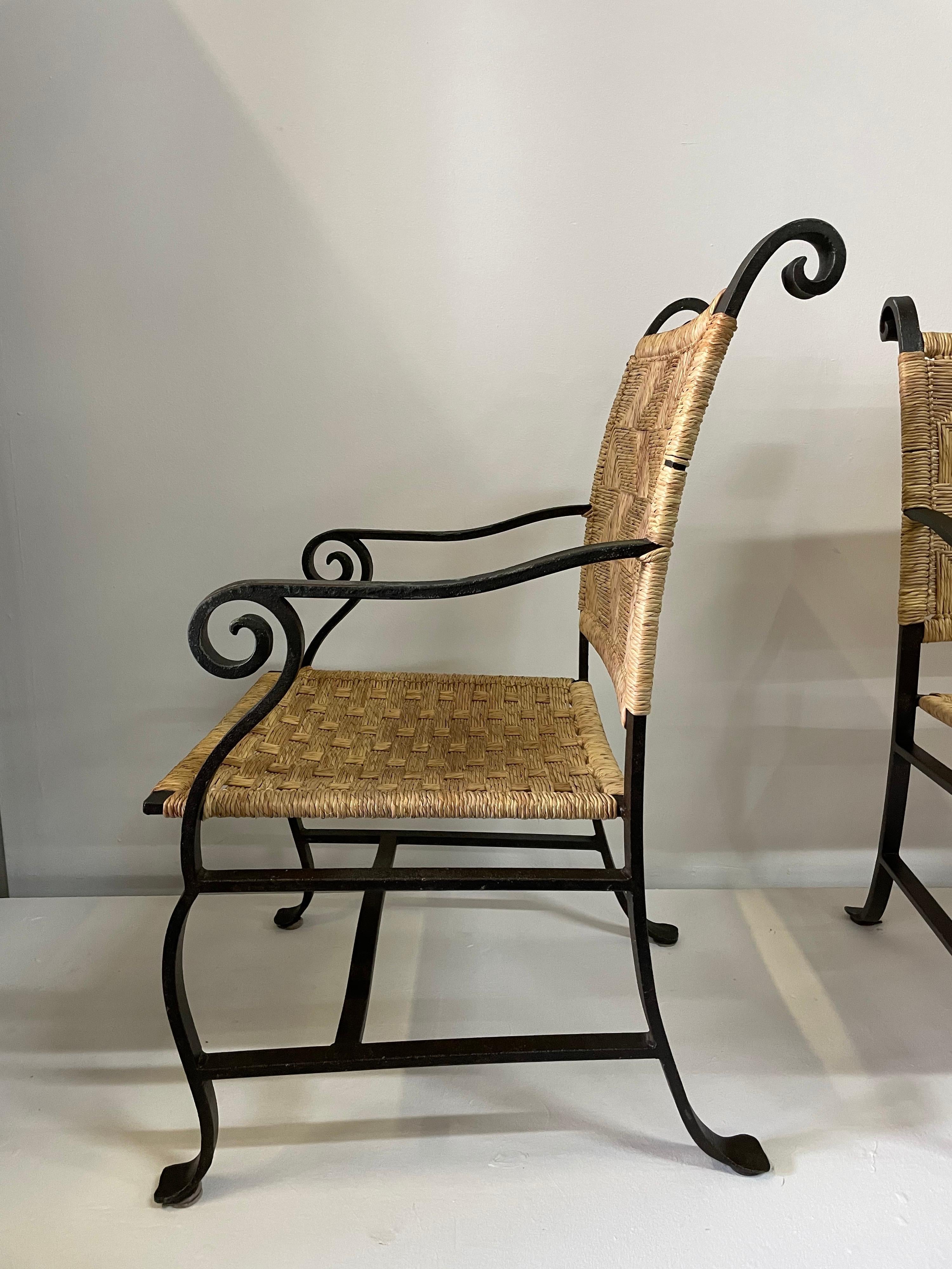 4 Hand Wrought Iron and Woven Raffia Armchairs In Good Condition For Sale In East Hampton, NY