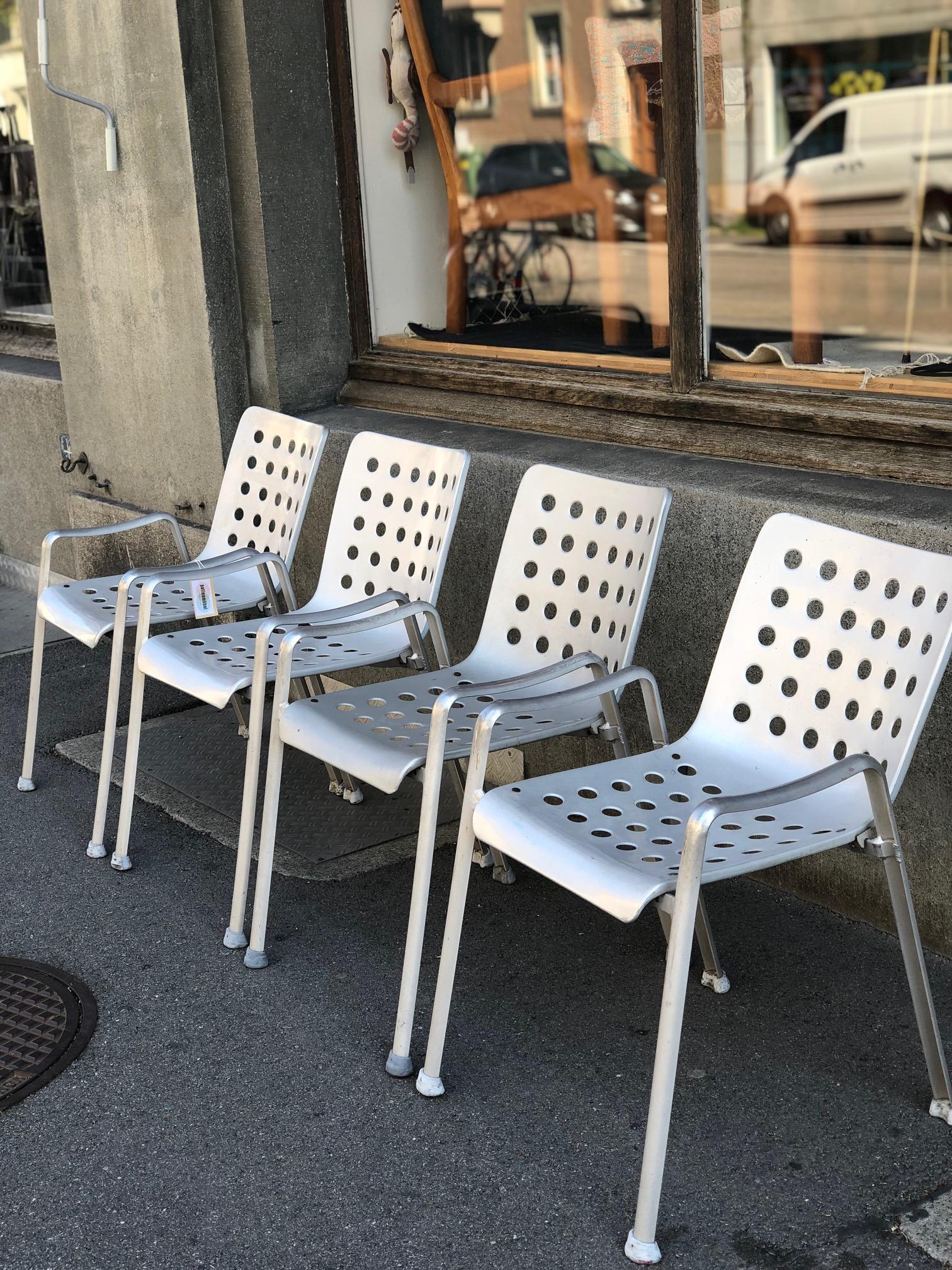 Set of 4 vintage Hans Coray aluminum “Landi” chairs. These examples have 60 holes in total which dates their manufacturing from 1962-1970 and was produced by MEWA, Switzerland. The Landi Chair was developed for the Swiss National Exhibition of 1939.