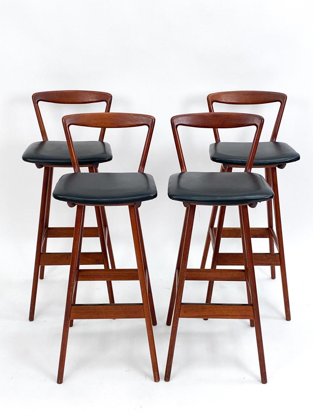 Welcome a fusion of craftsmanship and design elegance with this stunning set of Model 43 bar stools, masterfully conceived by Henry Rosengren Hansen for the celebrated Brande Mobelfabrik. These stools are more than mere seating—they are emblems of