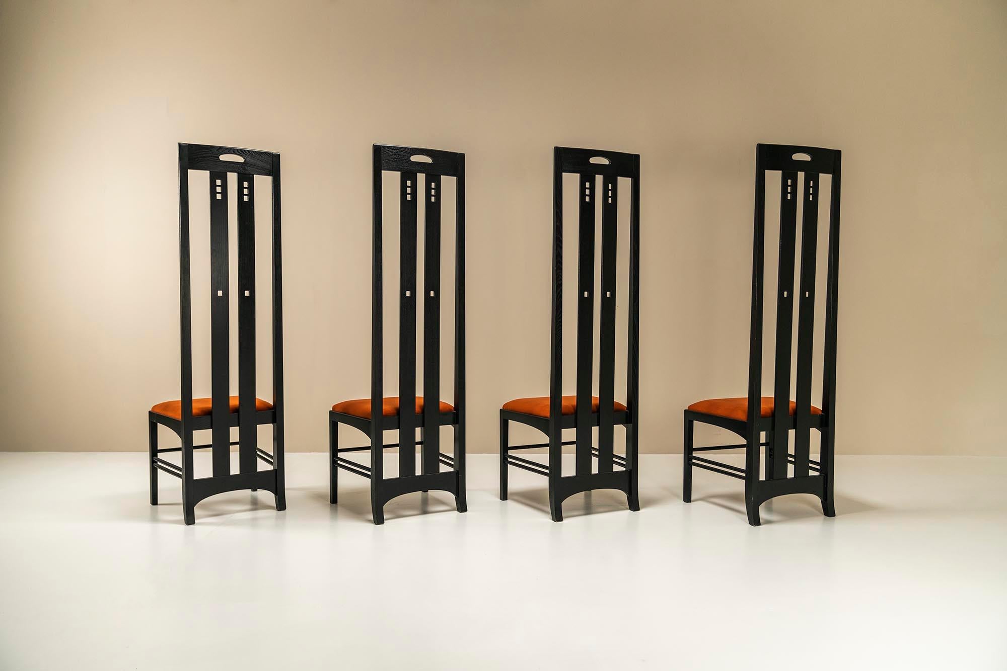 This set of four Charles Rennie Mackintosh model Ingram dining chairs embodies timeless elegance and a rich historical significance. Originally designed around 1910 for the White Dining Room of the Ingram Tea Rooms in Glasgow, Scotland, these chairs