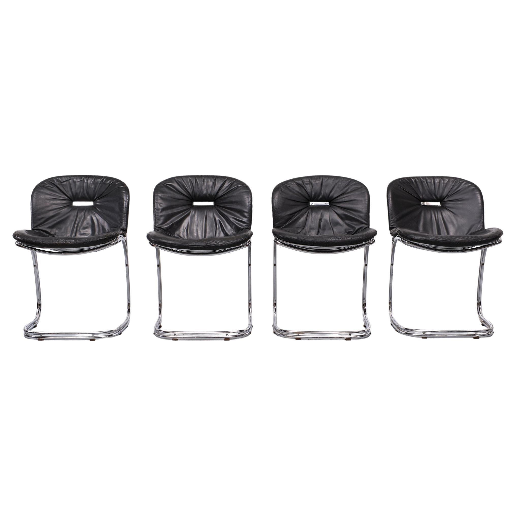 The Sabrina chair was designed by Gastone Rinaldi for RIMA, Padova, Italy in 1970. The Sabrina chair is published in the famous Italian standard reference for Interior Design and Furniture This set of four Sabrina Black leather chairs is from the