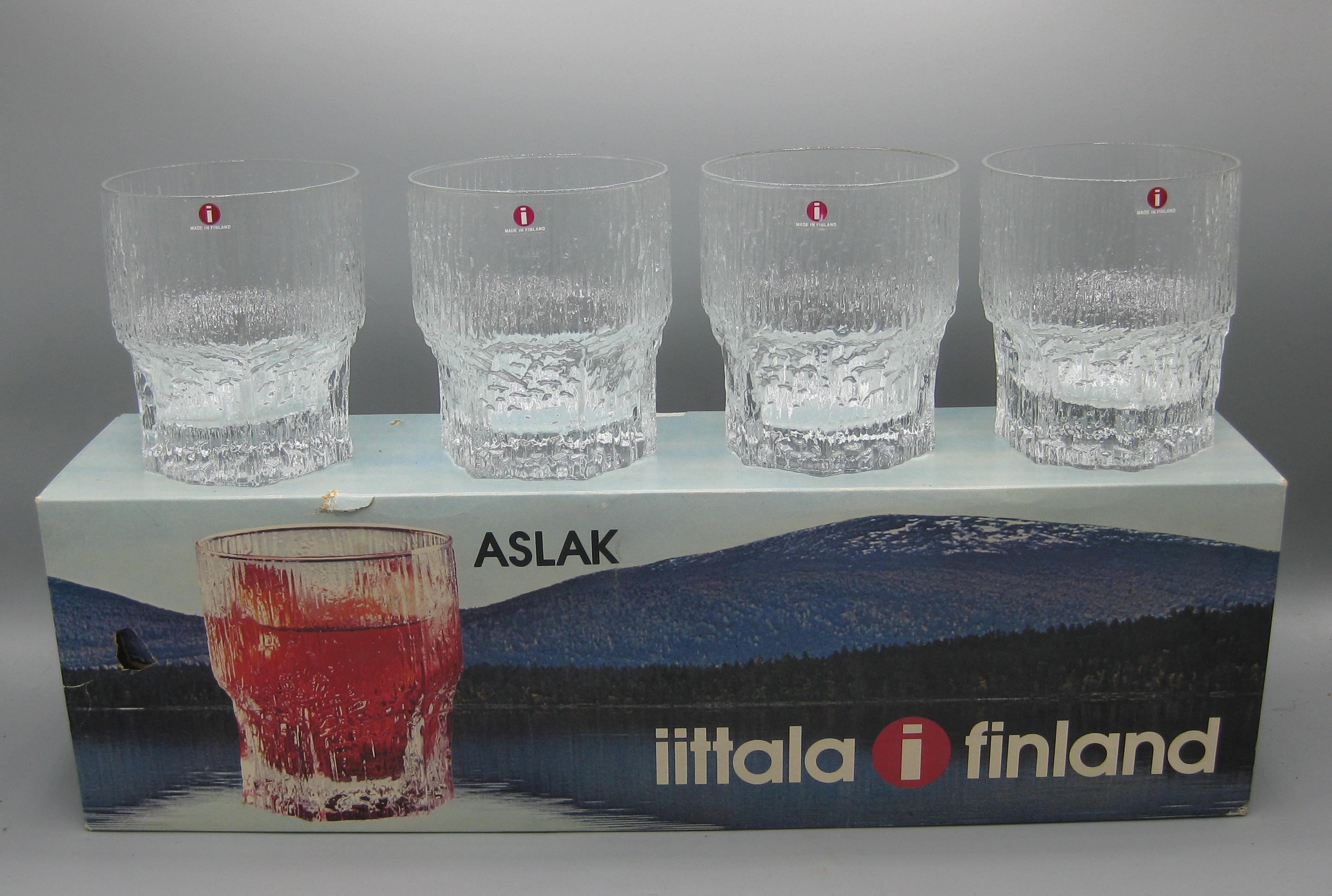 Rare set of 4 original iittala of Finland Aslak 12 ounce old fashion tumbler glasses. and date from the 1960's. These are new old stock and have never been used. They come in the original box and still has the original stickers on each glass.