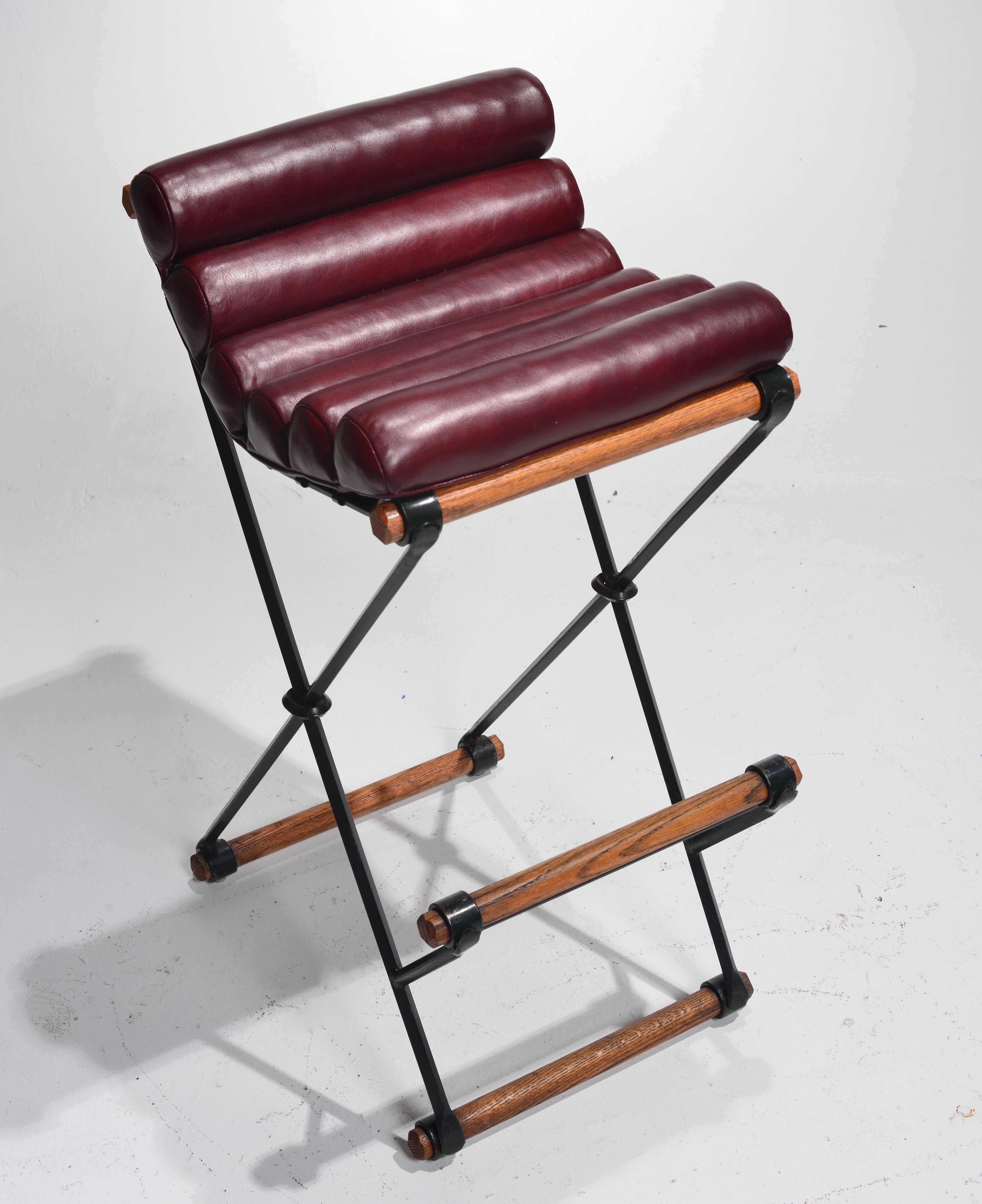 The Iron & Rolled Seat Bar Stool by Cleo Baldon effortlessly combines rugged industrial aesthetics with comfortable functionality, resulting in a versatile piece that enhances both modern and rustic interiors. Crafted with meticulous attention to