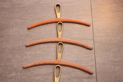 4 Leather-Coated Brass Coat Hangers by Carl Auböck