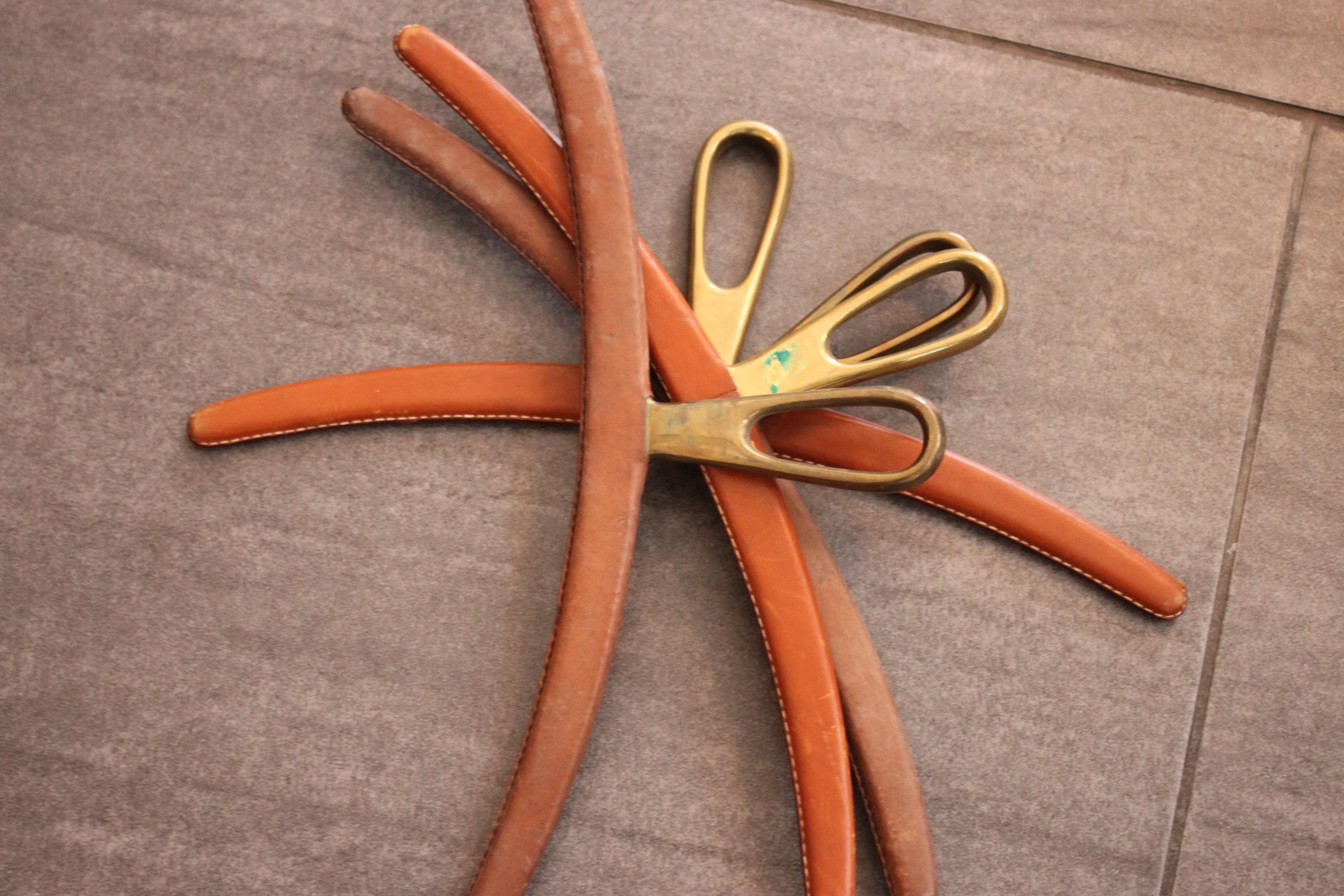 Mid-Century Modern 4 Leather-Coated Brass Coat Hangers by Carl Auböck For Sale