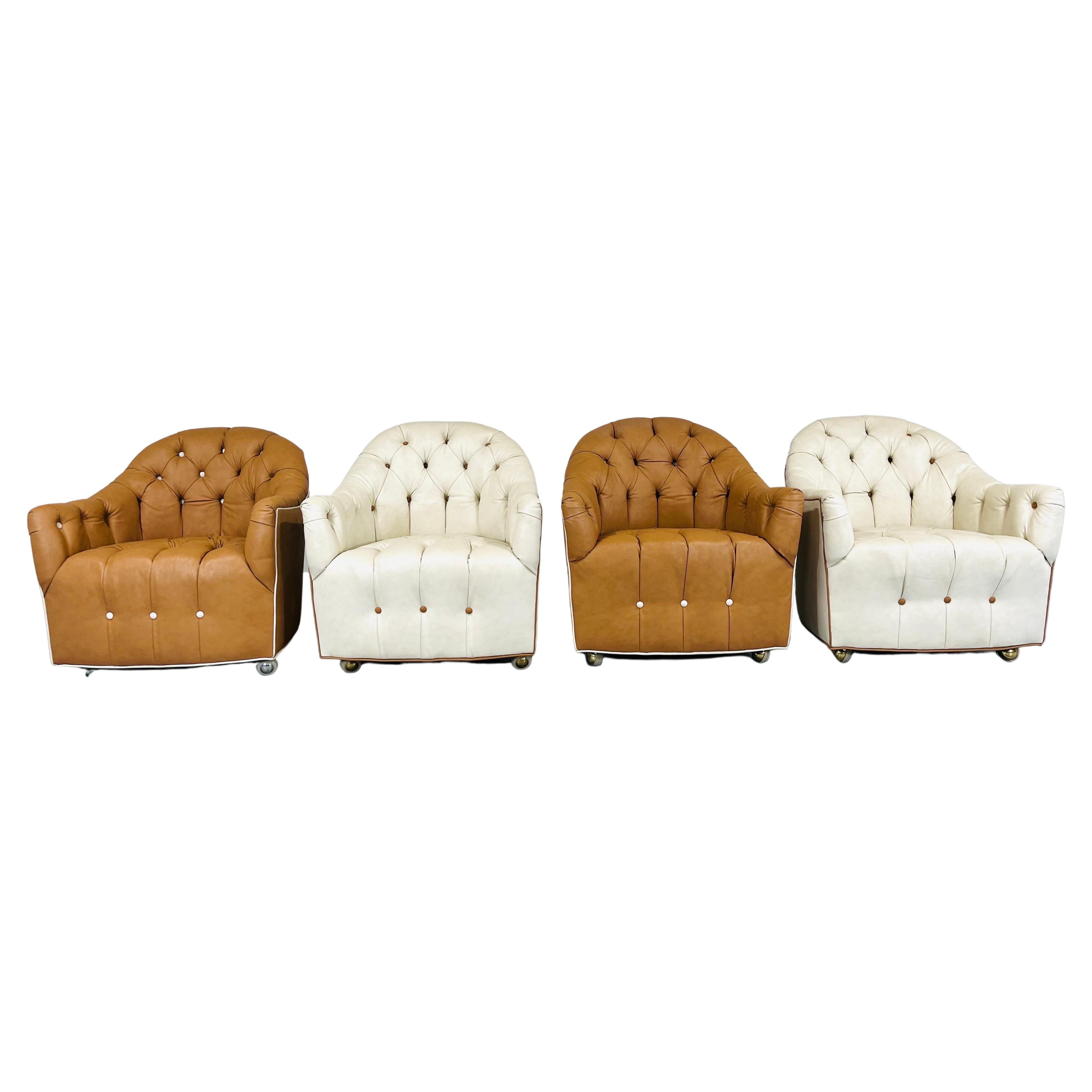 A beautiful 4 piece suite of tufted leather barrel back club chairs attributed to Ward Bennett having color complimentary tufting buttons over smooth rolling ball casters. 
 Extremely comfortable having barrel backs that hug your back perfectly.