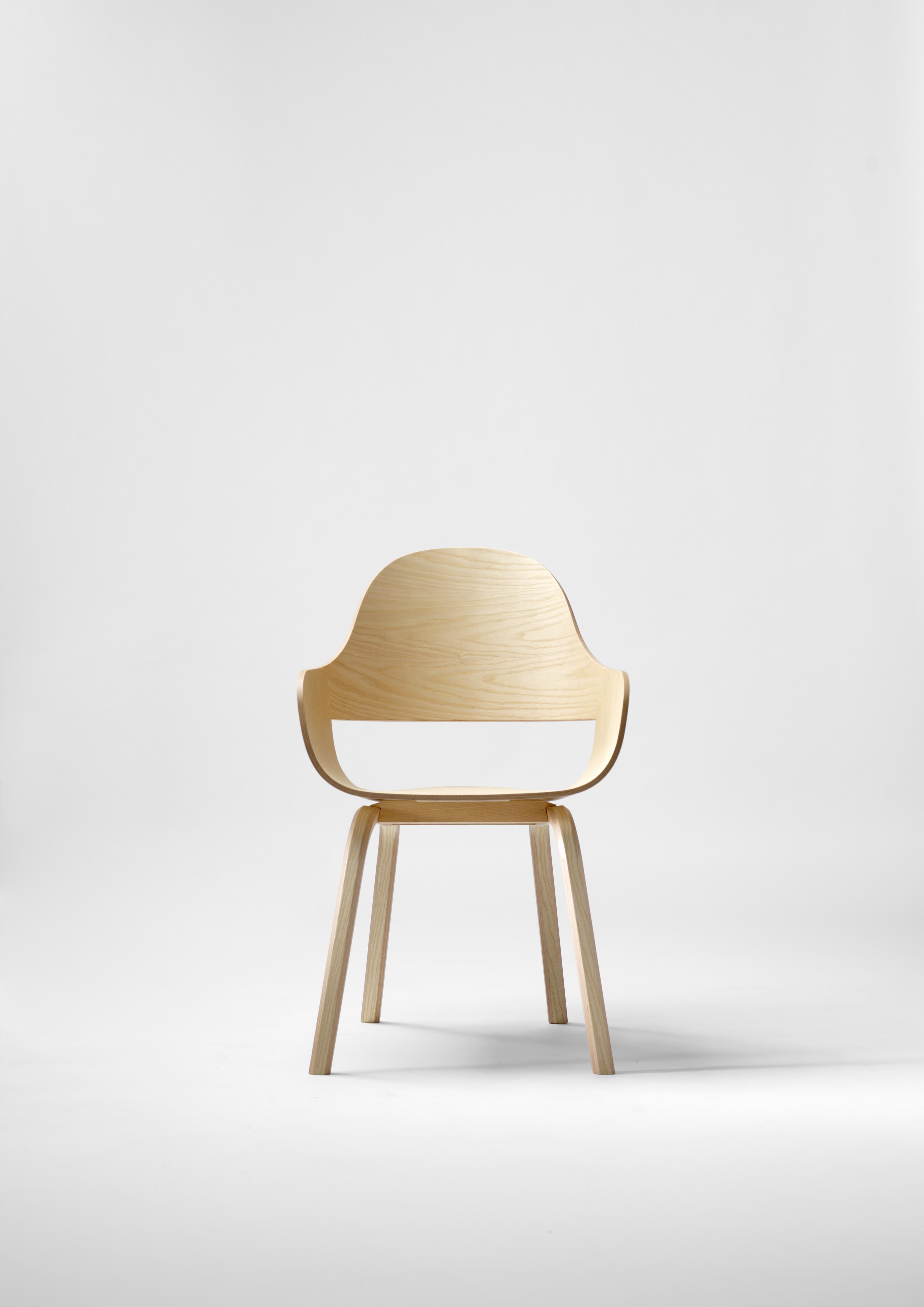 Powder coated steel or aluminium structure. Legs, seat and backrest in plywood with exteriors in natural ash. Metallic decorative buttons. 

A new version of the Showtime chair by Jaime Hayon which does not make the original design obsolete, but