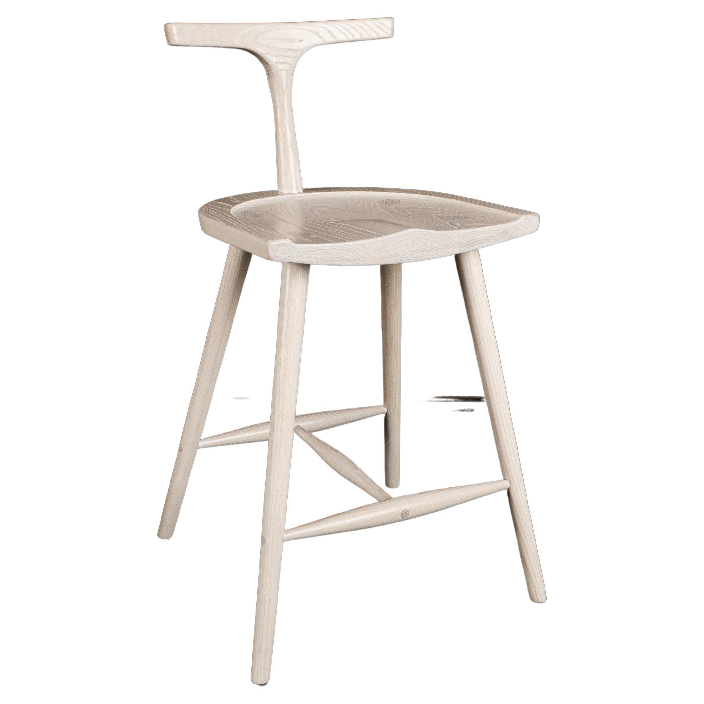 Comfortable, elegant and Classic, a design that will beautifully suit any home interior. Crafted from solid American ash, hand-selected for colour uniformity and quality. The Krane stool features a generously sized, ergonomically sculpted seat with