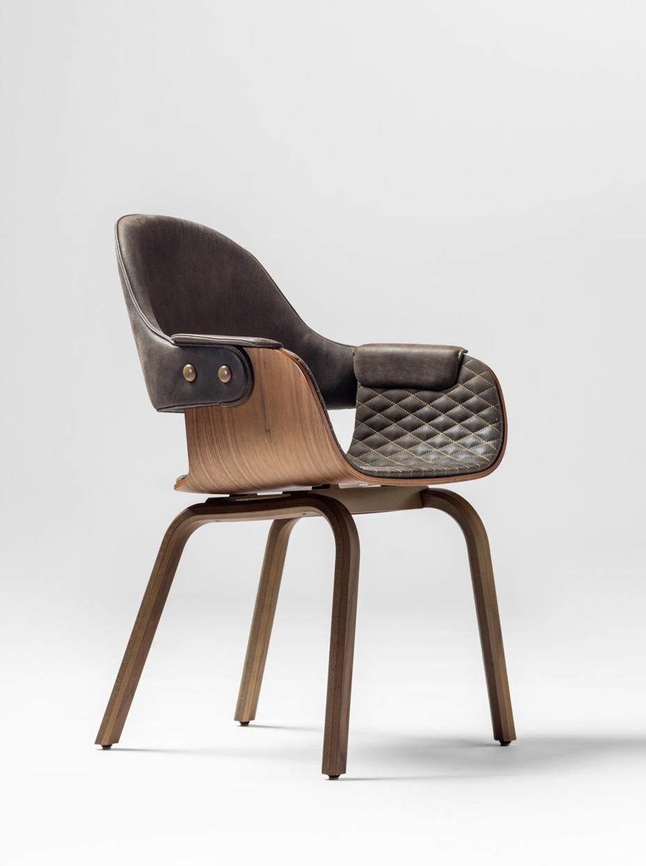 Modern 4 leg Showtime Nude chair in walnut, upholstered in leather by Jaime Hayon