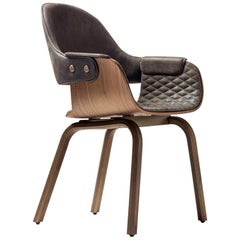 4 leg Showtime Nude chair in walnut, upholstered in leather by Jaime Hayon