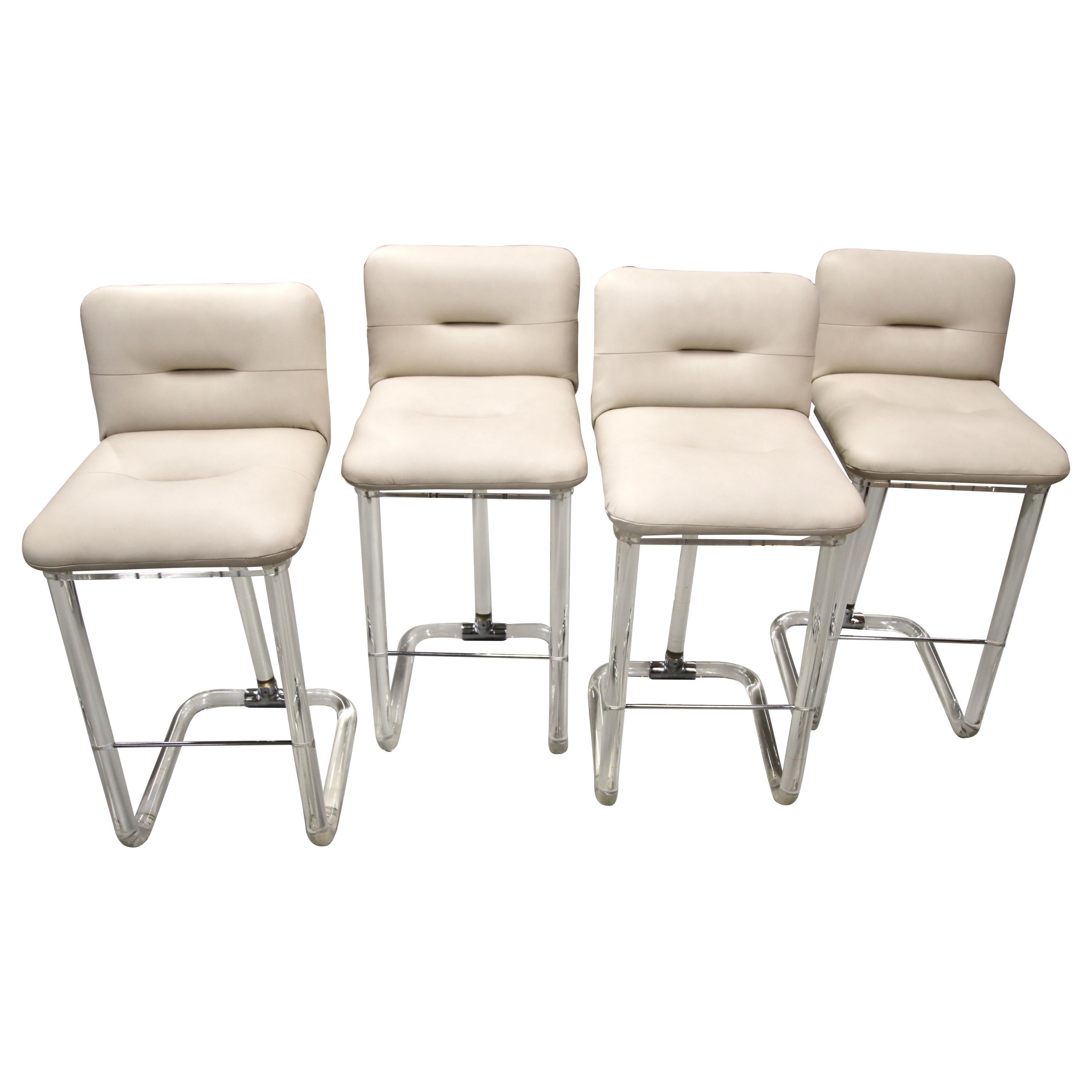 4 Lion in Frost Lucite Barstools