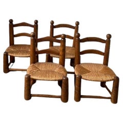 4 chaises de cheminée basses de Charles Dudouyt