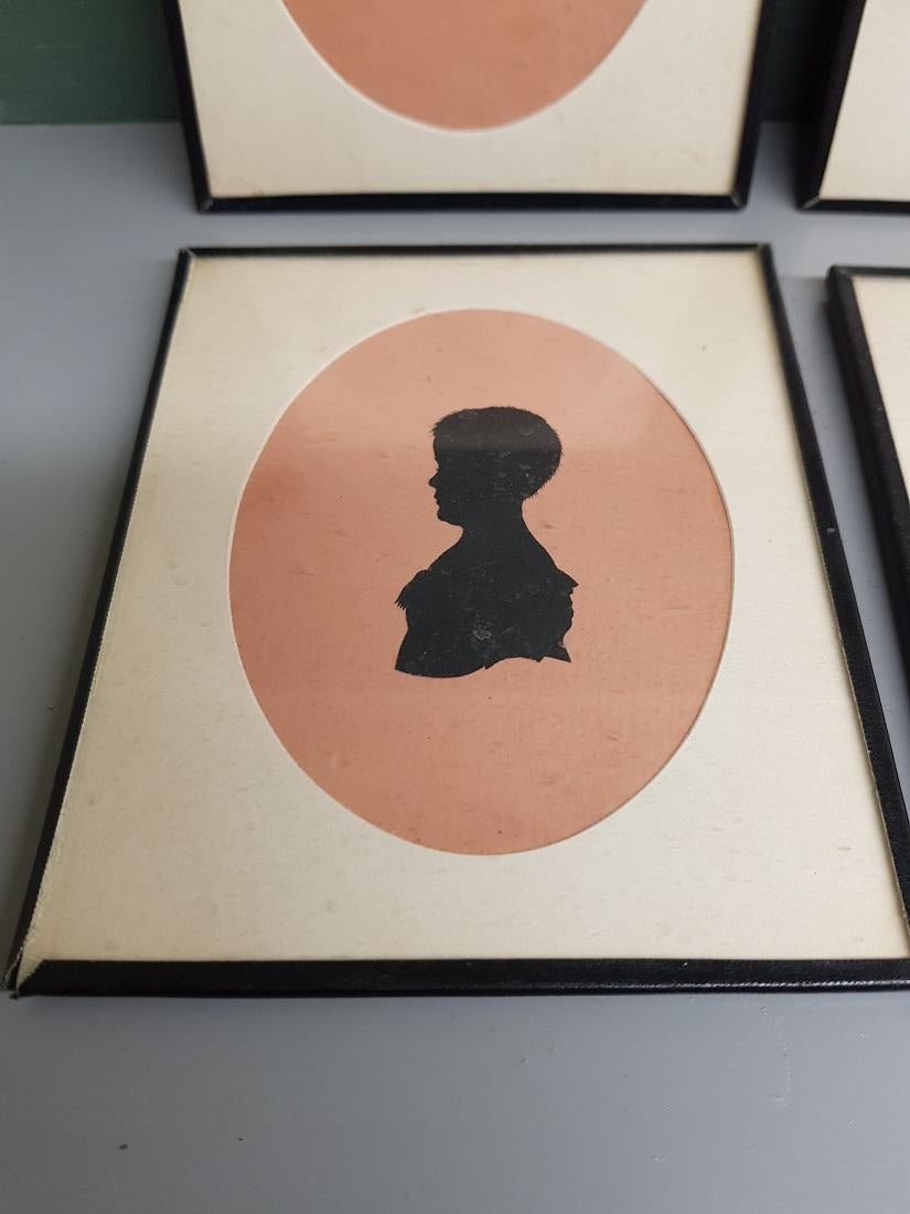 Hand-Crafted 4 Mid-19th Century Miniature Silhouettes of Probably a Mother with Daughters For Sale