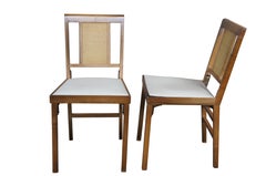 4 sillas plegables de mimbre de nogal, ratán y vinilo Legomatic de mediados de siglo